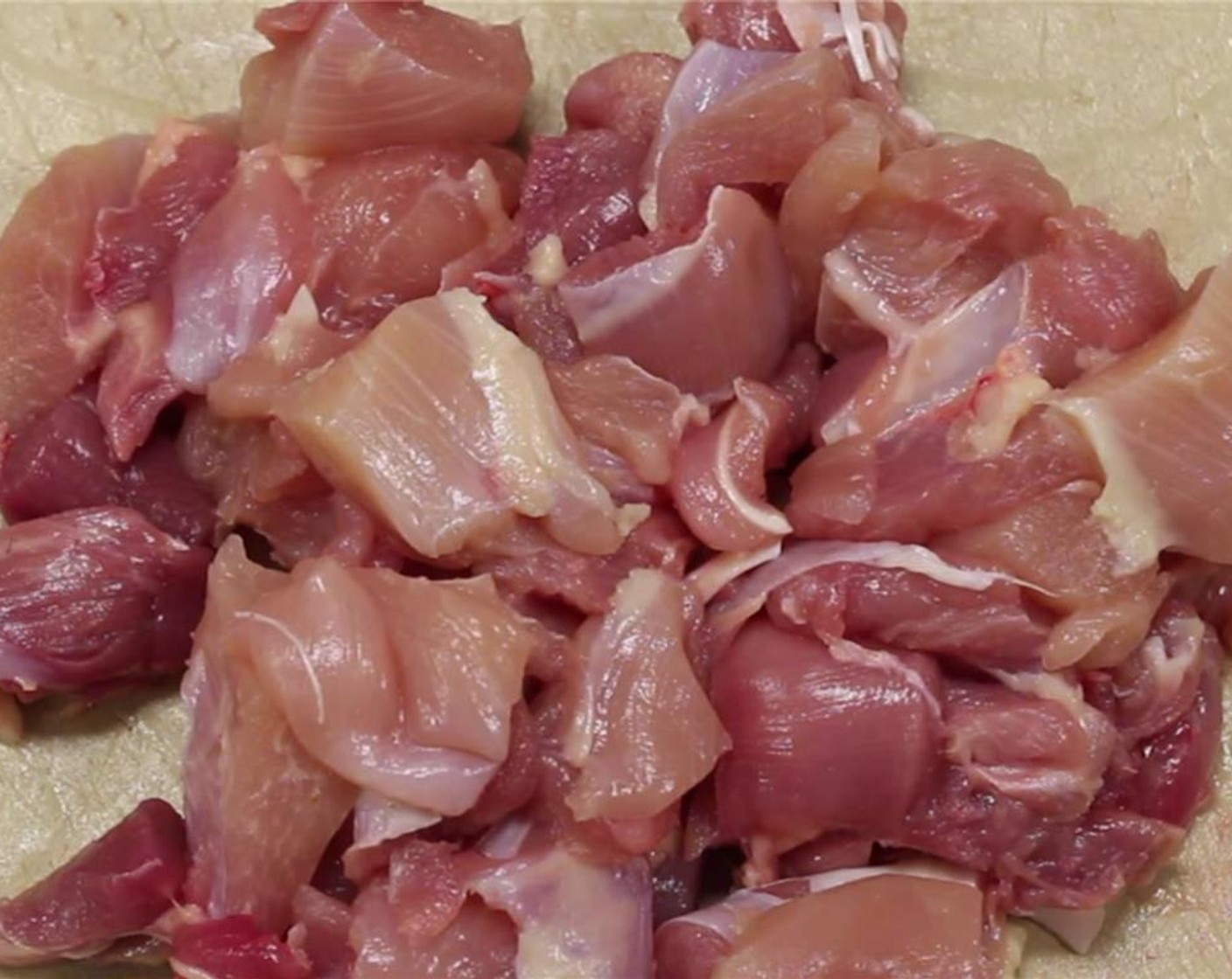 step 9 Cut the chicken into 1-inch strips, then cut into bite size pieces.