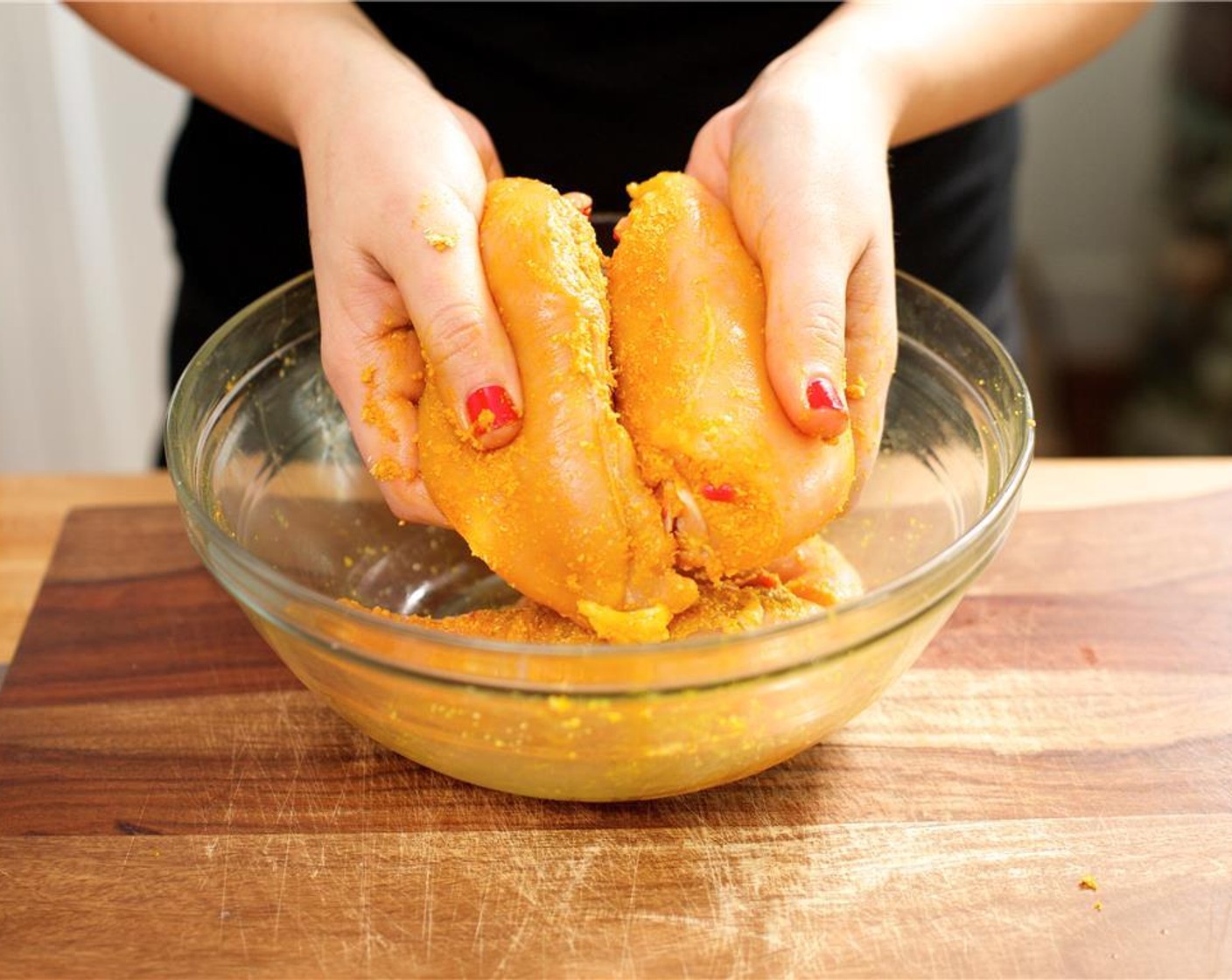 step 12 Sprinkle the Granulated Onion (1 tsp), Ground Turmeric (1/4 tsp), Salt (1 tsp), and Ground Black Pepper (1 tsp) onto both sides of the chicken.