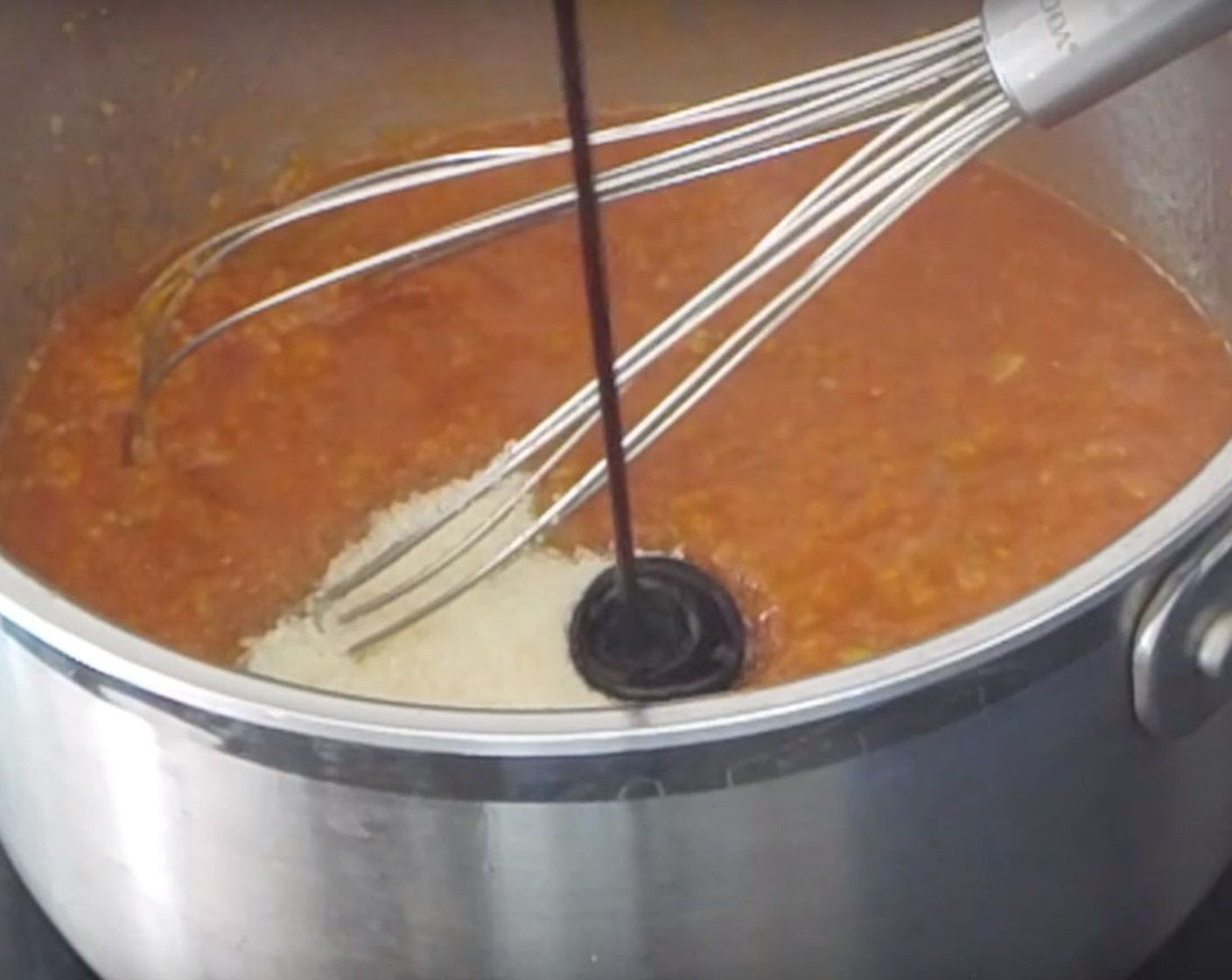 step 7 In a pot on high heat, add Water (1/2 cup) and Ketchup (1 1/2 cups). Add in the pureed veggies and mix them together. Mix in Granulated Sugar (4 Tbsp) and Molasses (2 Tbsp). After that, also mix in Rice Vinegar (1 Tbsp) and Red Chili Pepper (1/2 tsp). Reduce the heat to medium, and cook for five to ten minutes under the lid.