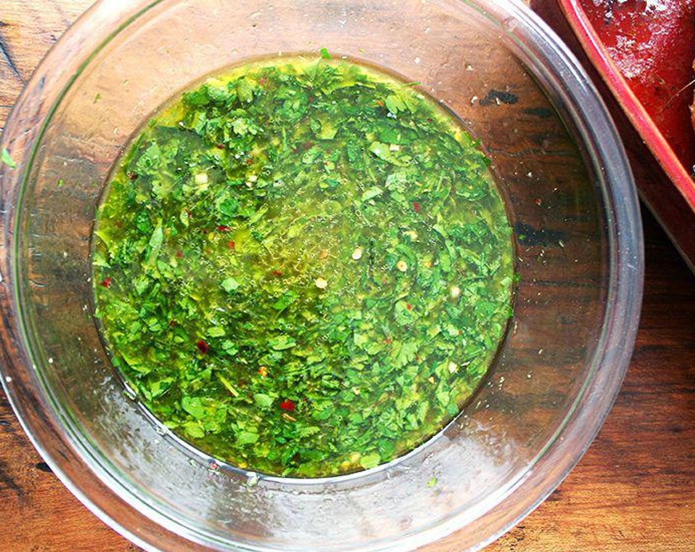 step 3 Combine Garlic (2 cloves), Kosher Salt (1 tsp), Freshly Ground Black Pepper (to taste), Crushed Red Pepper Flakes (1/4 tsp), Fresh Parsley (1/2 cup), White Wine (2/3 cup), Chicken Stock (1/2 cup), Olive Oil (1/4 cup), zest and juice from Lemon (1) in a bowl and whisk to blend.
