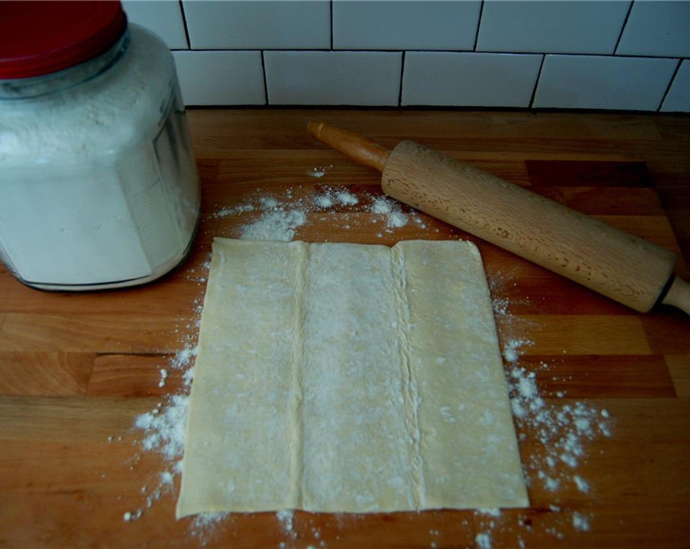 step 3 Lightly flour your rolling surface and gradually roll out the Puff Pastry (2 pieces) with a rolling pin.