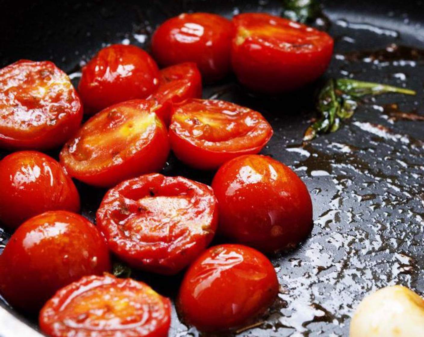 step 3 In a skillet heat up 1 tsp of Extra-Virgin Olive Oil (1/2 tsp) and Garlic (1 clove) on a medium high heat, when the garlic turns a light golden color add the tomatoes, season with salt and pepper. Fresh Basil Leaves (3)  and Dried Oregano (1 tsp) to the seared tomatoes and sauté for 1 minute . Remove from the heat.