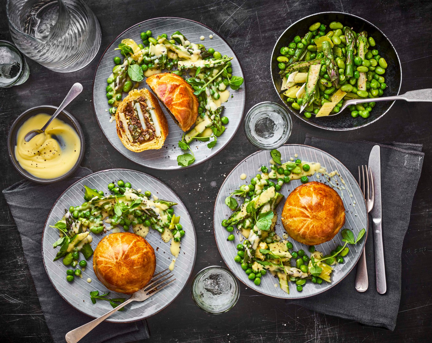 Potato, porcini and Comté pithivier with a beurre blanc and spring