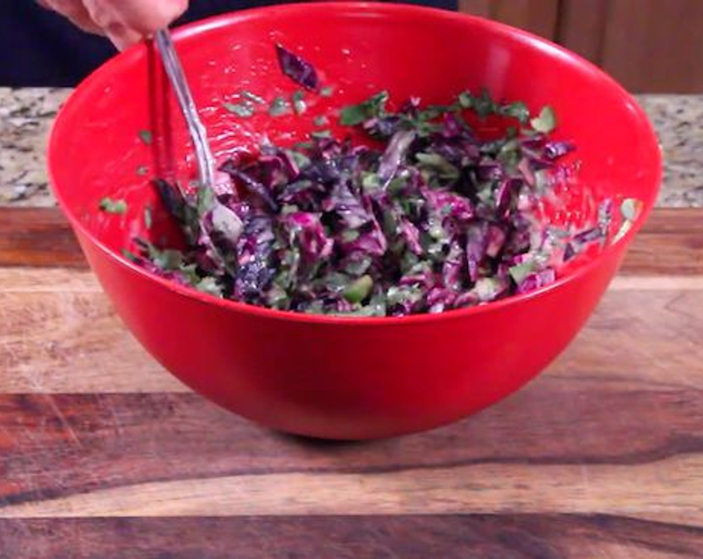 step 3 Meanwhile, make the slaw: In a large bowl, whisk together Mayonnaise (4 Tbsp), juice from a Lime (1), Fresh Cilantro (2 Tbsp) and Honey (1 Tbsp). Stir in Red Cabbage (2 cups), Corn Kernels (1 cup) and Jalapeño Pepper (1); Season with Kosher Salt (to taste) and Freshly Ground Black Pepper (to taste).
