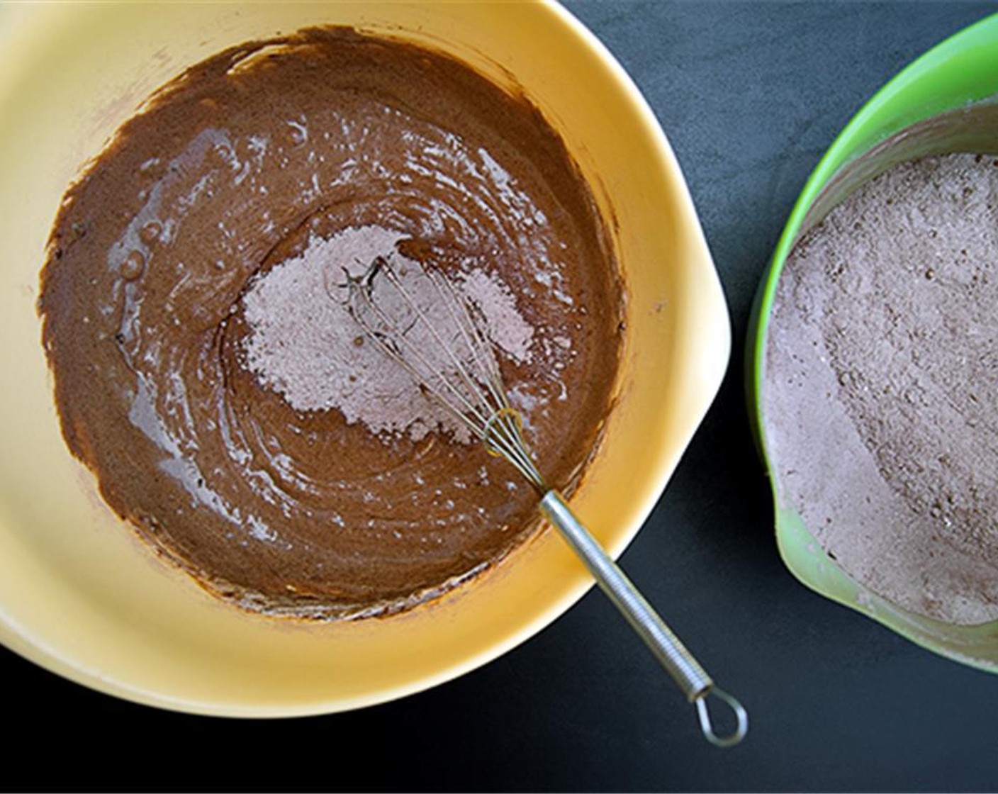 step 3 In another bowl, whisk Eggs (2), Greek Yogurt (3/4 cup), Vegetable Oil (1/4 cup), and Vanilla Extract (1/2 Tbsp) until blended.