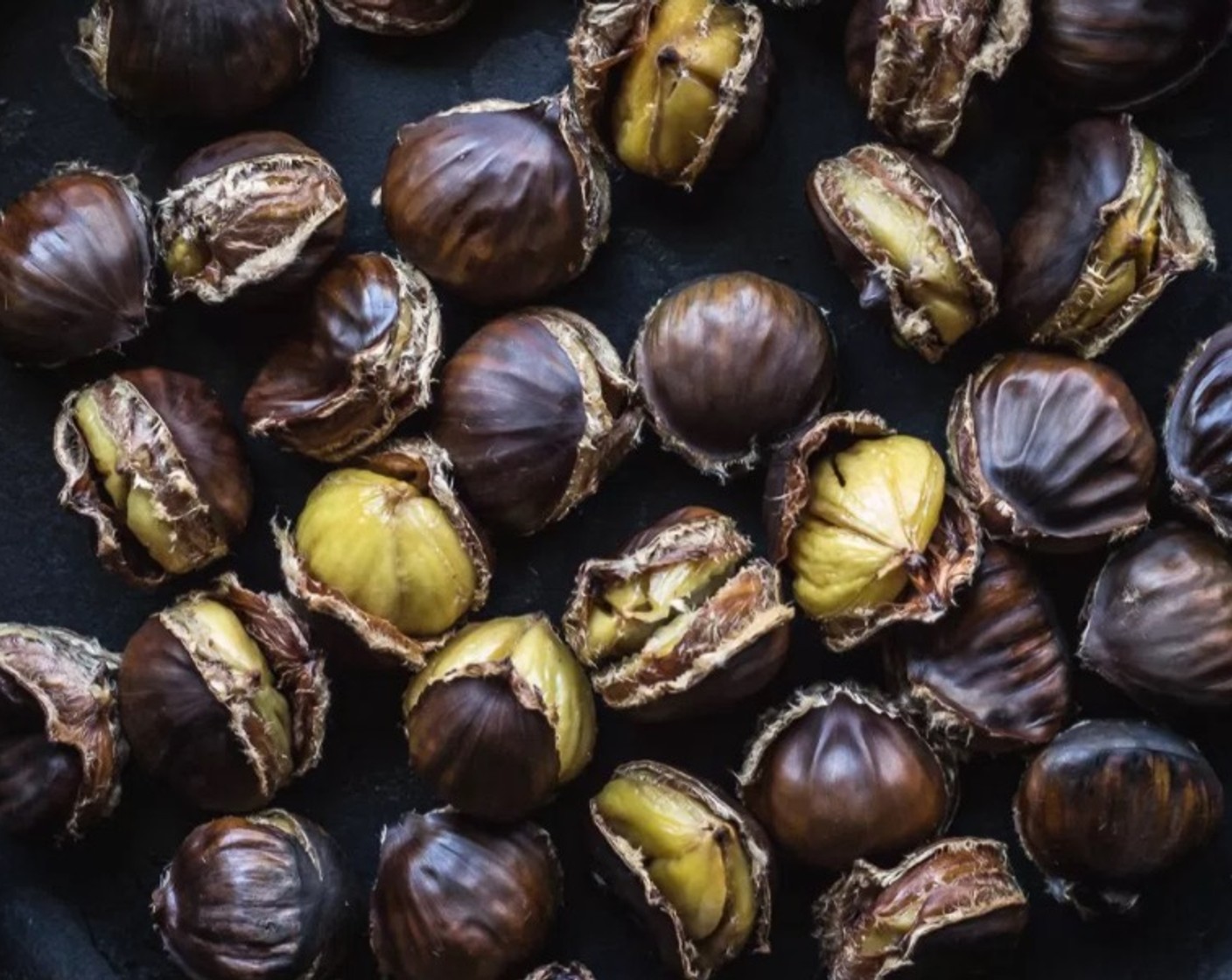 step 7 Keeping the chestnuts covered so they stay warm, one by one remove each chestnut from their shell and skin.