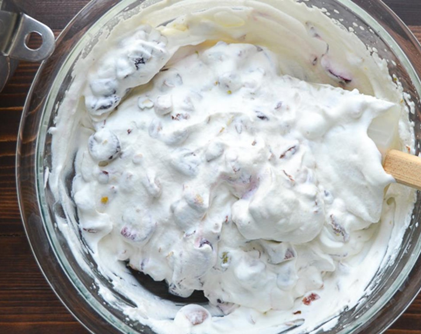 step 9 Add the cream mixture to the meringue and with a rubber spatula, gently fold it in until completely combined.