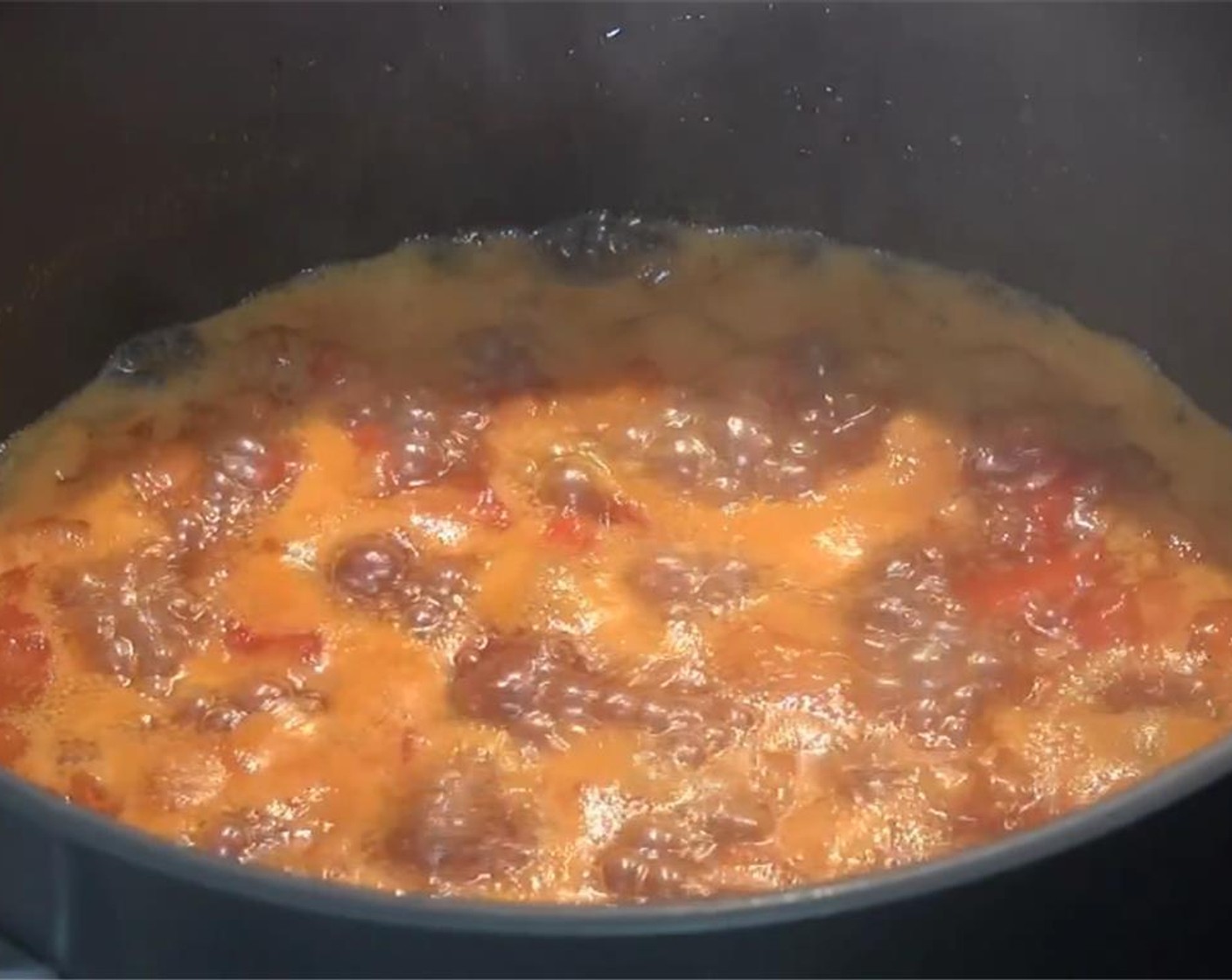 step 4 Once boiling, reduce the heat to simmer gently for about 30 minutes or until the mixture has thickened up.