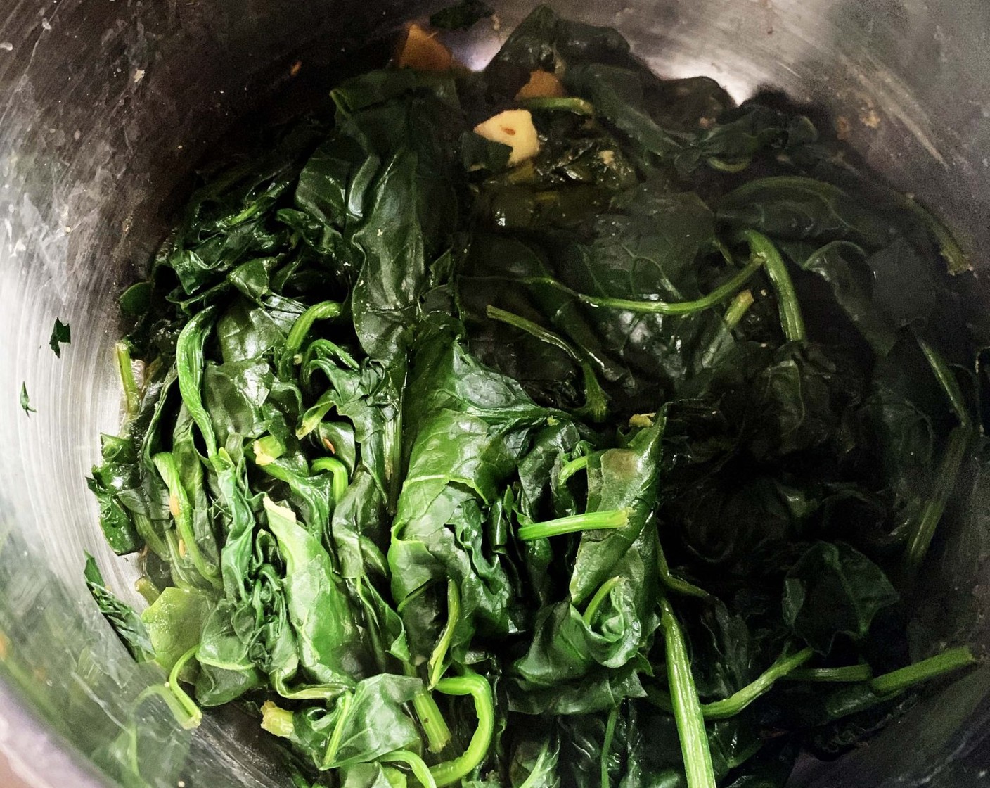 step 2 Cook with lid on low heat for about 15 minutes or until spinach is soft.