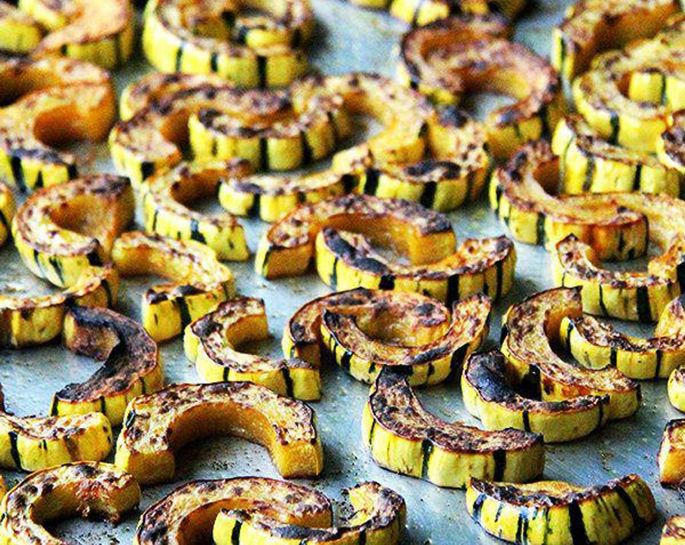 step 4 Roast until the underside of the squash slices are evenly browned, then stick the pan under the broiler for 3-4 minutes or until the top is evenly golden. Remove the pan from the oven and set aside.