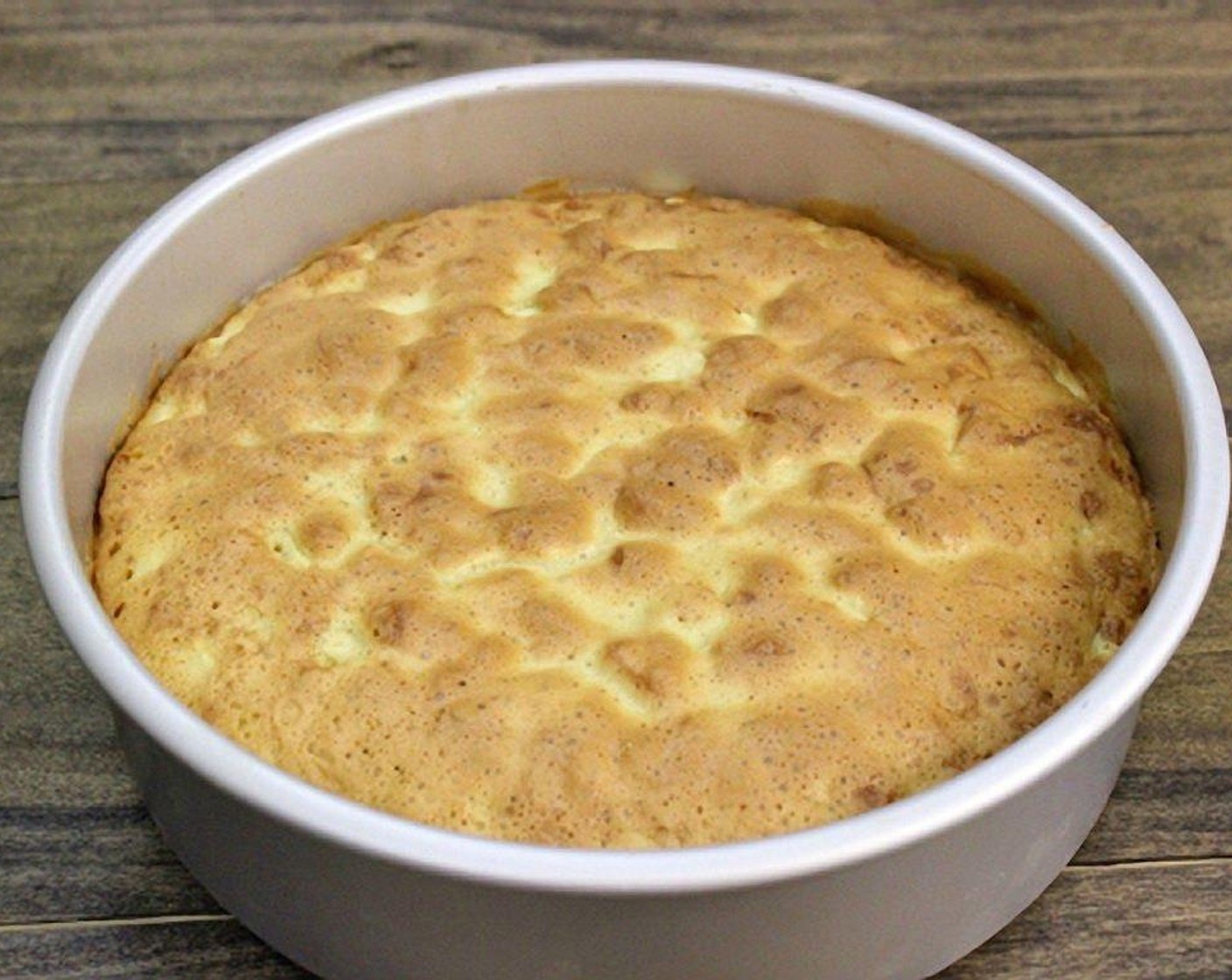 step 9 Bake in the preheated 350 degrees F (180 degrees C) oven for 45-50 minutes, until the Sharlotka is golden, or when a toothpick comes out clean from the center of the cake.