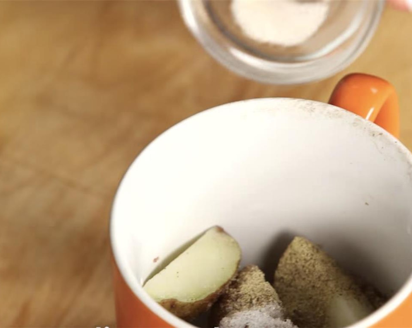 step 5 Into the mug, add Salt (1/2 tsp), Ground Black Pepper (1/4 tsp), and Simply Organic Garlic Powder (1/4 tsp). Mix everything together with a spoon.
