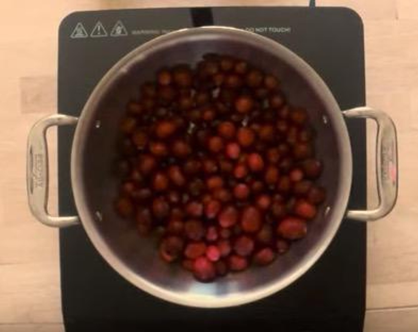 step 1 In a medium saucepan over high heat, combine Fresh Cranberries (3 1/3 cups), Demerara Sugar (2/3 cup), Water (3/4 cup), Dry Sherry (1/4 cup), Fresh Rosemary (1/2 Tbsp), Fresh Sage (1/2 Tbsp), Fresh Thyme (1/2 Tbsp), Salt (1/4 tsp), Freshly Ground Black Pepper (1/4 tsp), and Lemons (to taste).