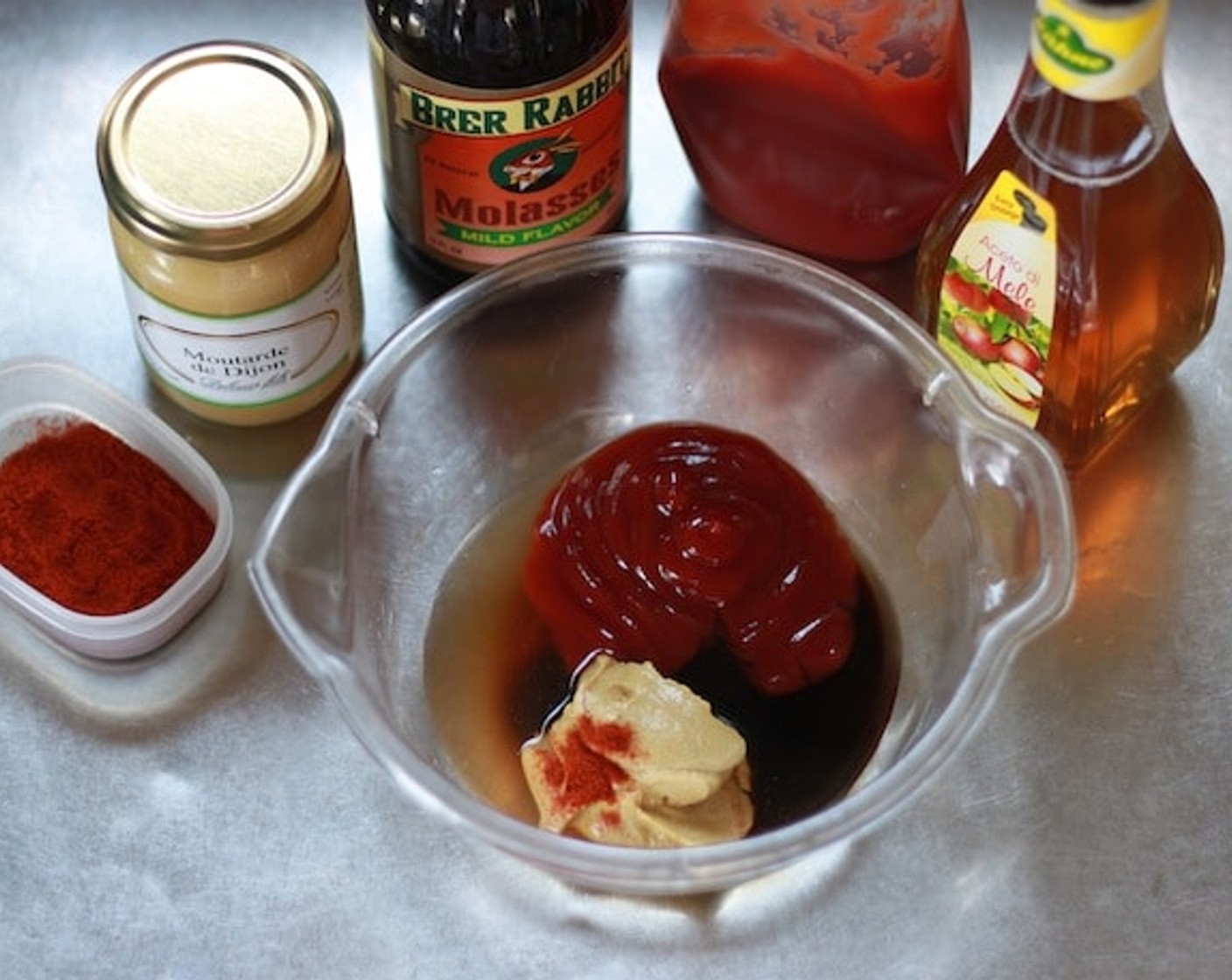 step 11 While waiting for your Neatloaf to bake. Prepare the Ketchup (1 cup), Yellow Mustard (1/4 cup), Molasses (1/4 cup), Apple Cider Vinegar (1/4 cup), and Cayenne Pepper (1/2 Tbsp).