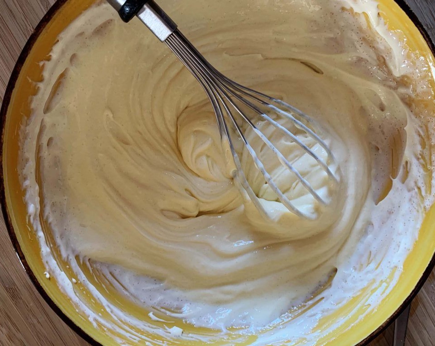 step 4 In a large bowl whisk yolks of the Eggs (3), Vanilla Extract (1 tsp), Granulated Sugar (1/2 cup) and Mascarpone Cheese (1 cup) until you get a smooth cream.