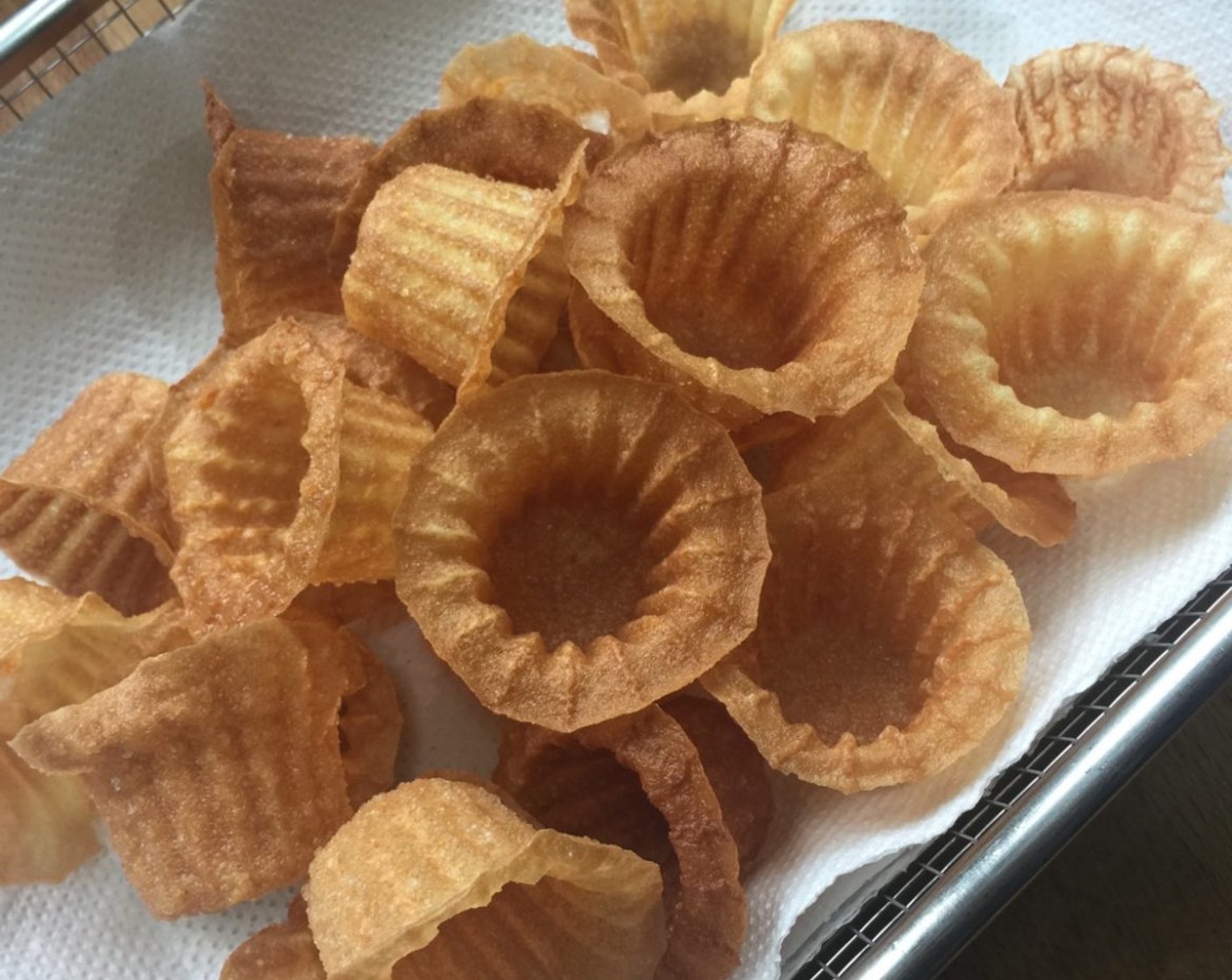 step 19 Drain the fried pie tee shells over paper towels and store in an air tight container once completely cooled.