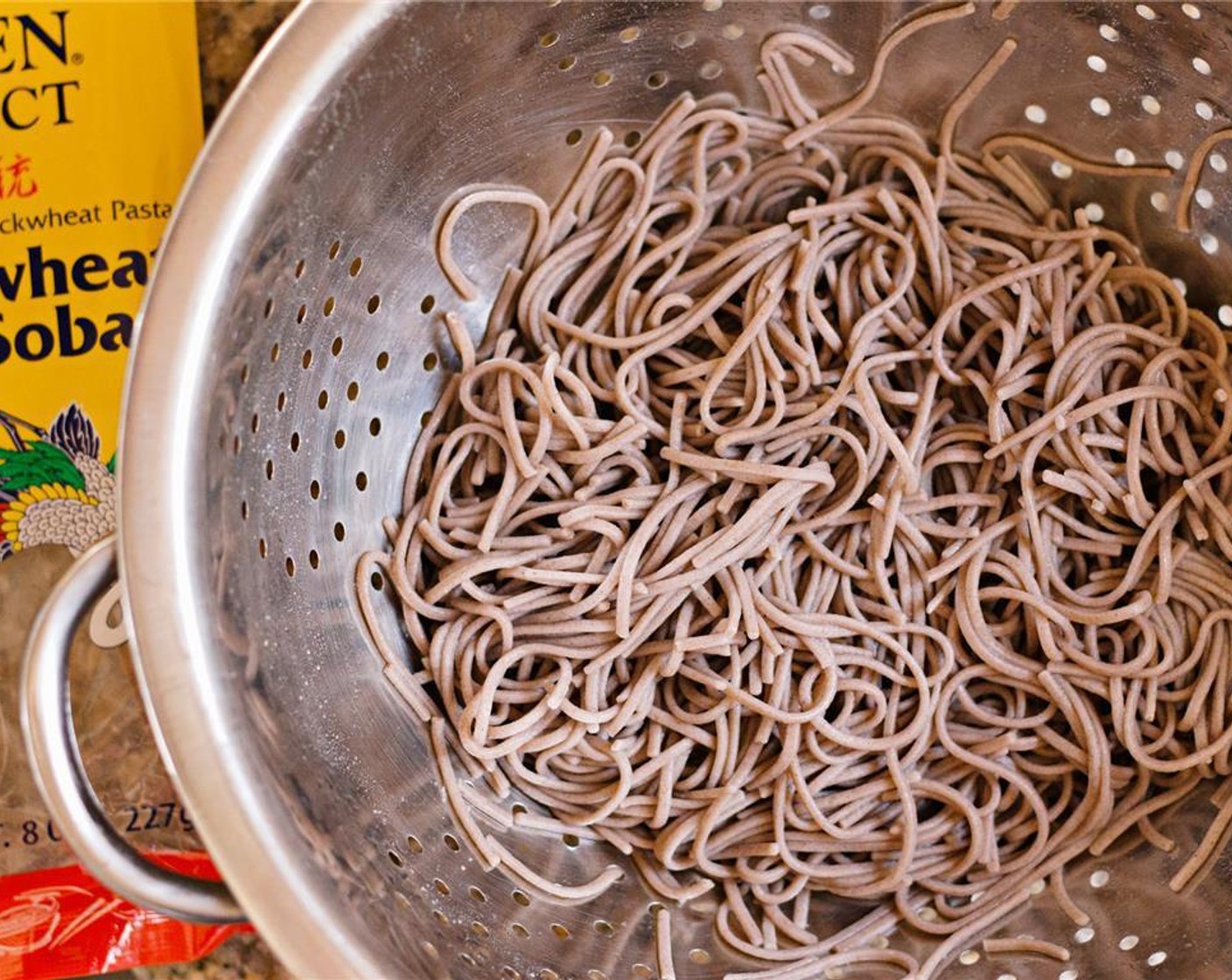 step 6 Bring a large pot of water to a boil. Cook the Soba Noodles (1 pckg) for 7-8 minutes. Drain and rinse with cold water.