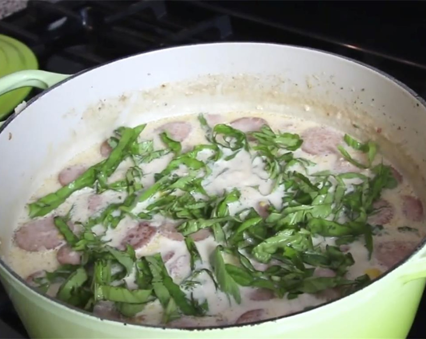 step 12 Add the cooked sausage and cook for a minute or two to heat up the sausage. Taste for final seasoning. Add some sliced Fresh Basil (to taste).