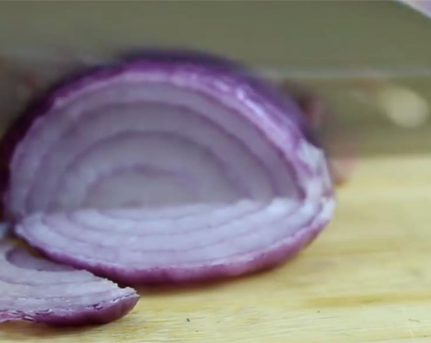 step 4 Peel and slice the  Red Onion (1/2) .