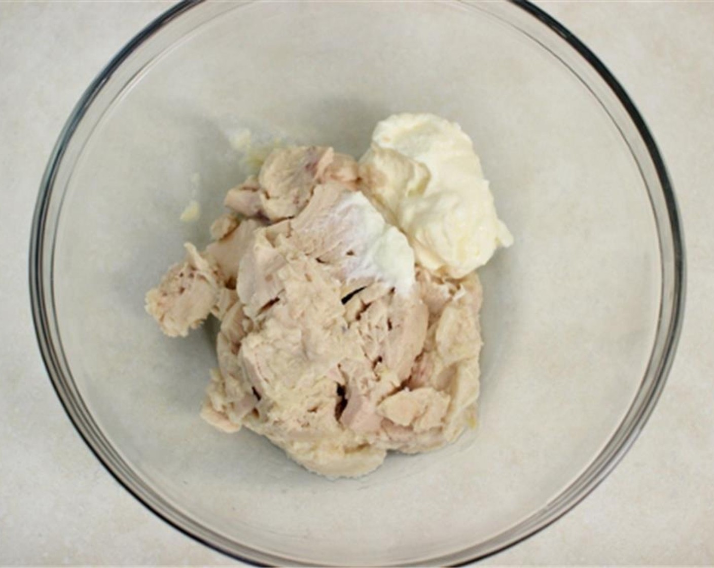 step 6 Drain the Canned Tuna (1 cup) and mash it with a fork. Mix the tuna with Mayonnaise (1/4 cup).