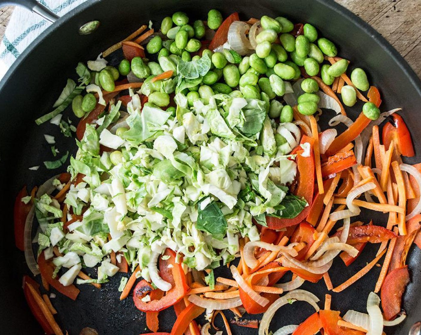 step 4 Add Brussels Sprouts (3/4 cup) and Edamame (1/2 cup) and cook another 5-7 minutes or until all vegetables are crisp tender - or cooked to your liking.