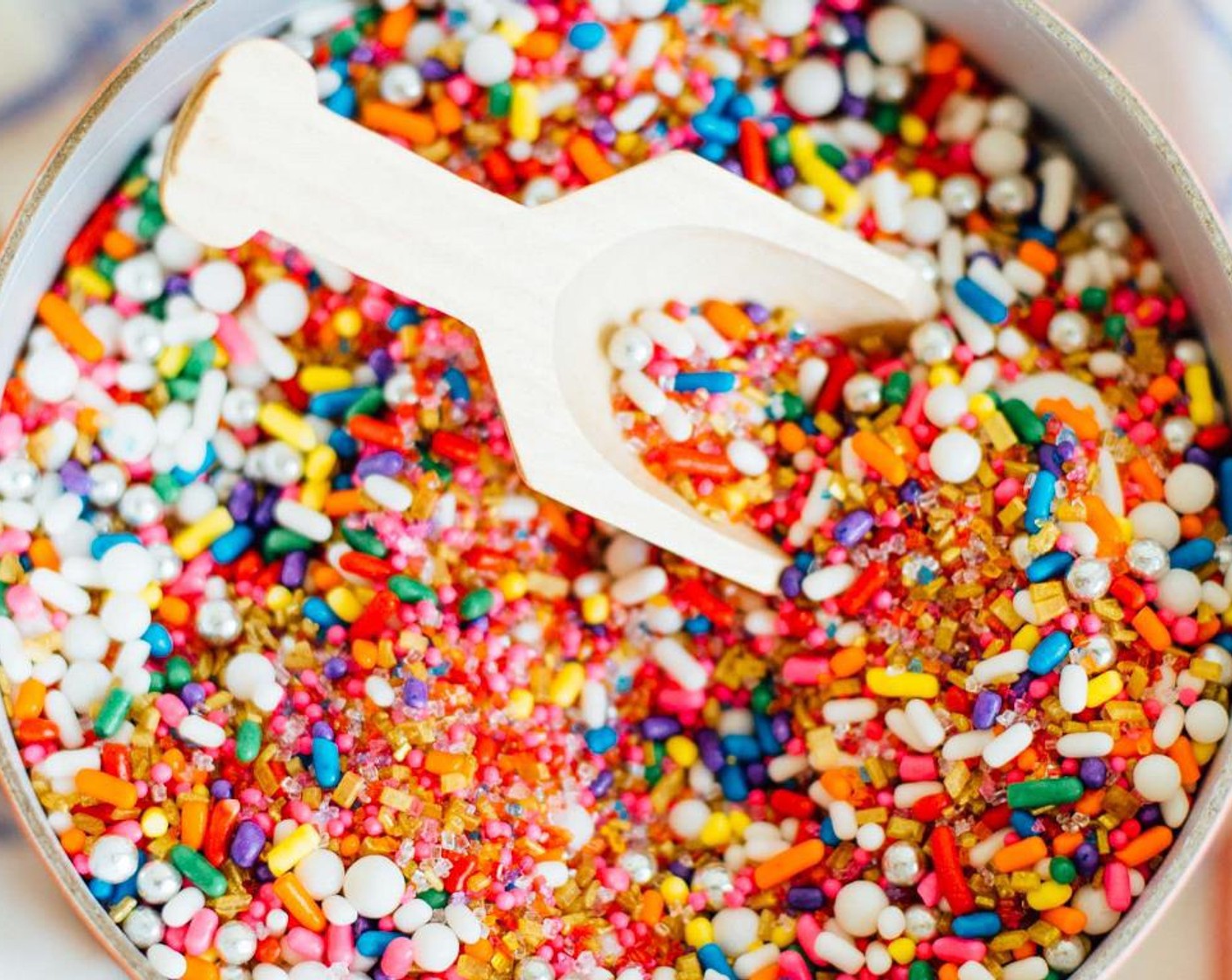 step 3 Make glazed doughnut rim by mixing Milk (1 Tbsp) and Powdered Confectioners Sugar (4 Tbsp) until combined. Dip glass into glaze and then into Sprinkles (4 Tbsp).