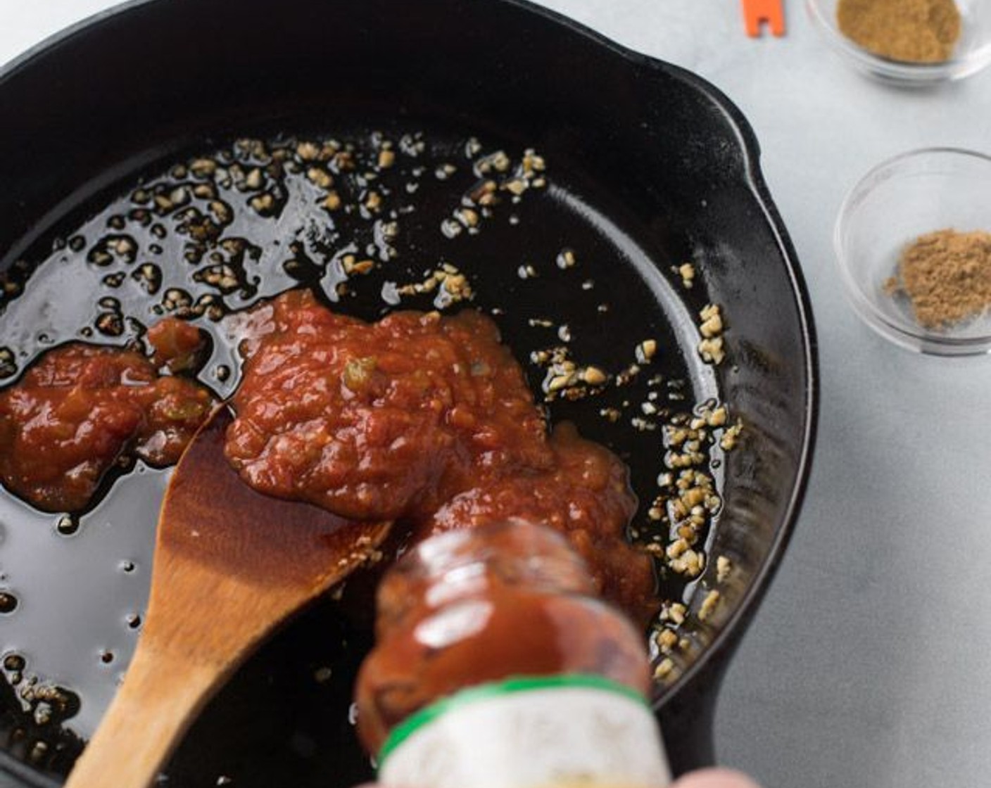 step 3 Add to pan the Mild Salsa (1 cup), Diced Tomatoes (1 cup), Ground Cumin (1 tsp), Ground Coriander (1/2 tsp) and Ground Cloves (1/8 tsp). Bring to a boil for around 5 minutes, and then remove pan from heat.