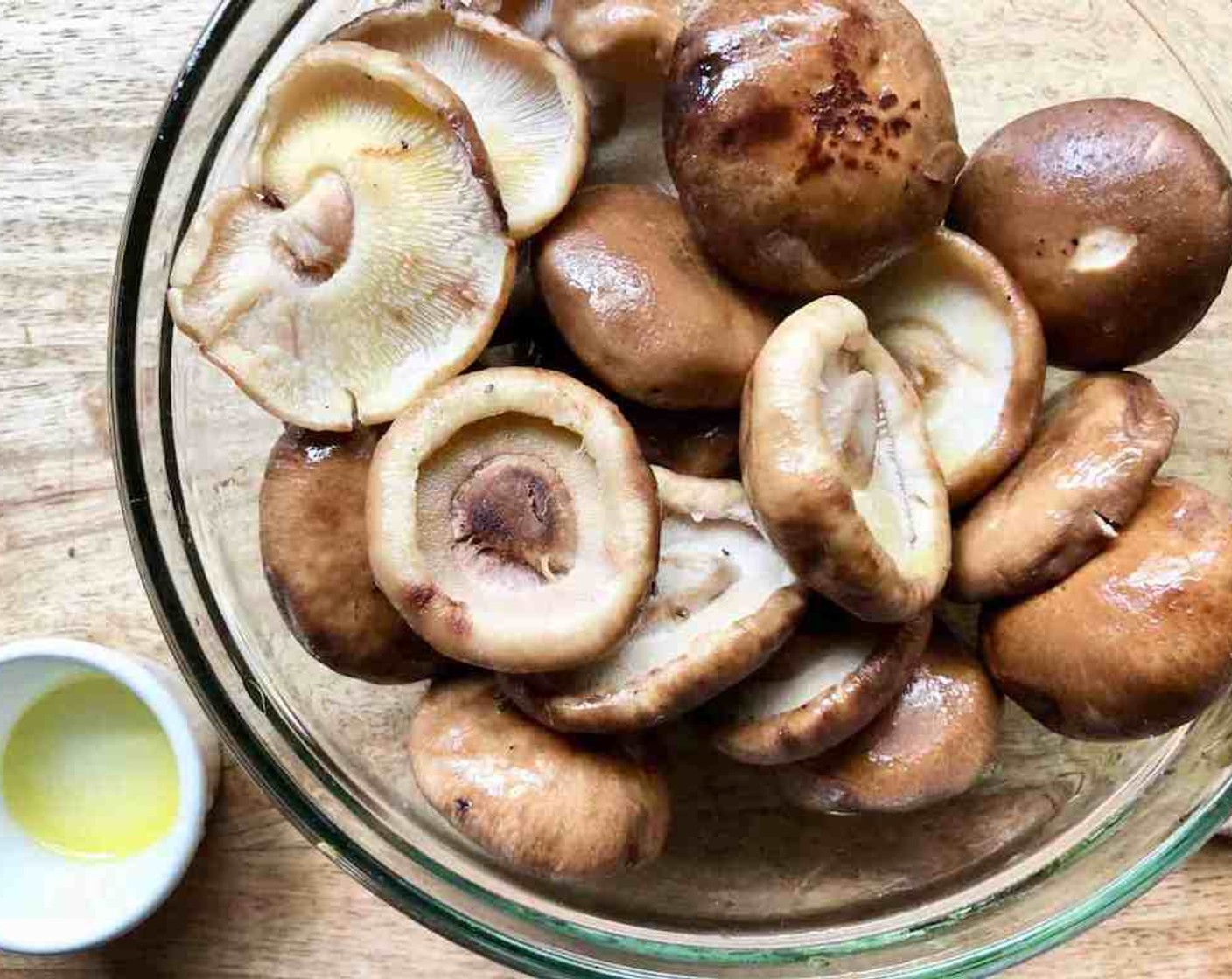 step 6 Meanwhile, toss the Shiitake Mushrooms (1 3/4 cups) with the remaining Olive Oil (1 Tbsp). Season with Salt (to taste) and Freshly Ground Black Pepper (to taste).