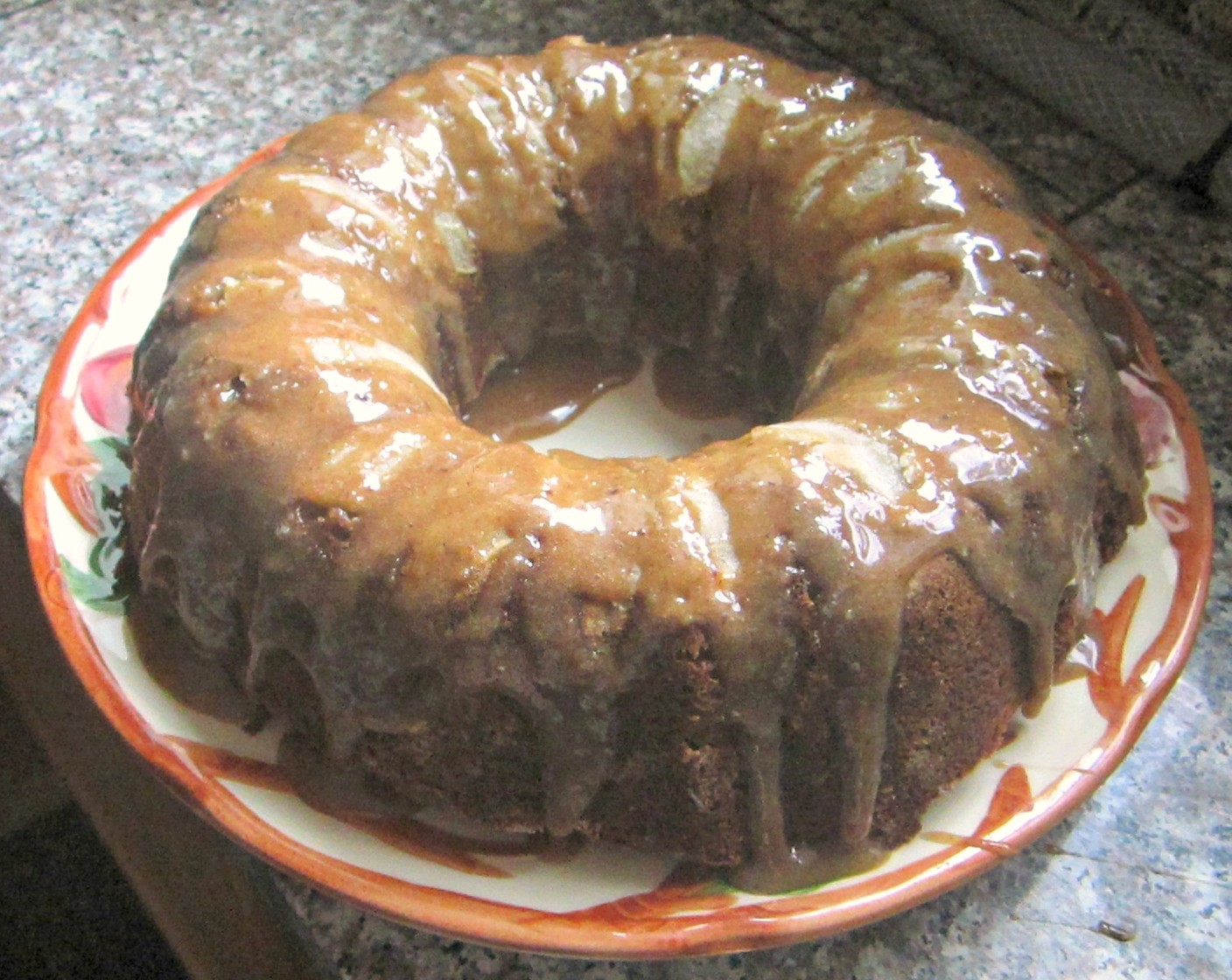 step 16 Your cake should pop out of the pan and be sitting pretty waiting for its glaze. Simply drizzle glaze over cooled cake. Serve and enjoy!