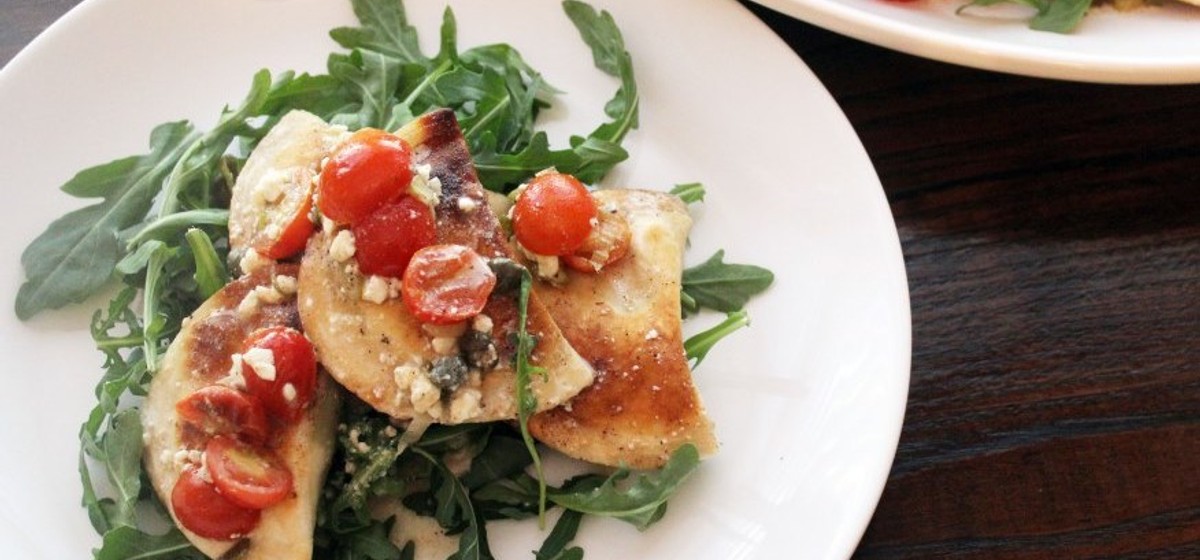 Pierogi with Feta, Tomato, and White Wine Sauce Recipe | SideChef