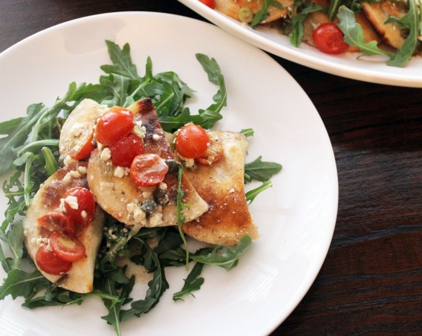 Pierogi with Feta, Tomato, and White Wine Sauce