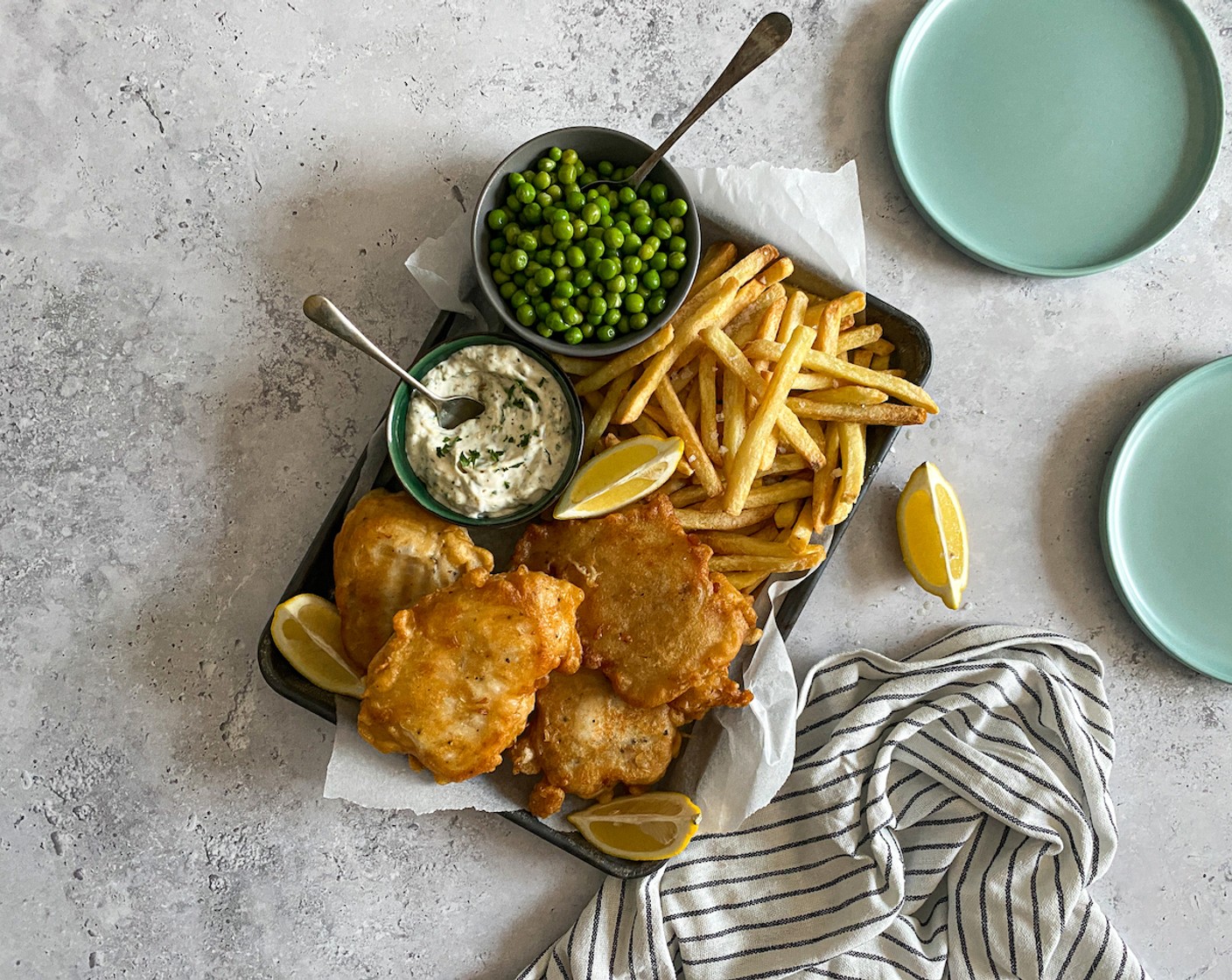 step 9 Serve crispy fried fish immediately with fries, buttery peas, Tartar Sauce (to taste), and Lemon Wedge (1).
