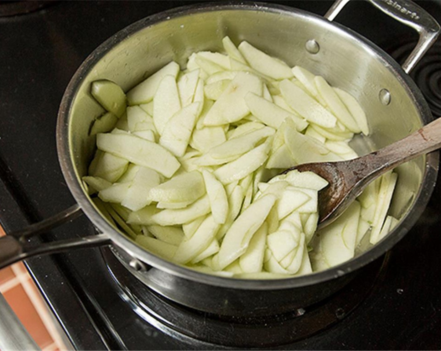 step 3 In a large skillet, melt 1/4 of the stick of Butter (2 Tbsp) Add the apple mixture and cook over moderate heat stirring occasionally until softening but not brown.