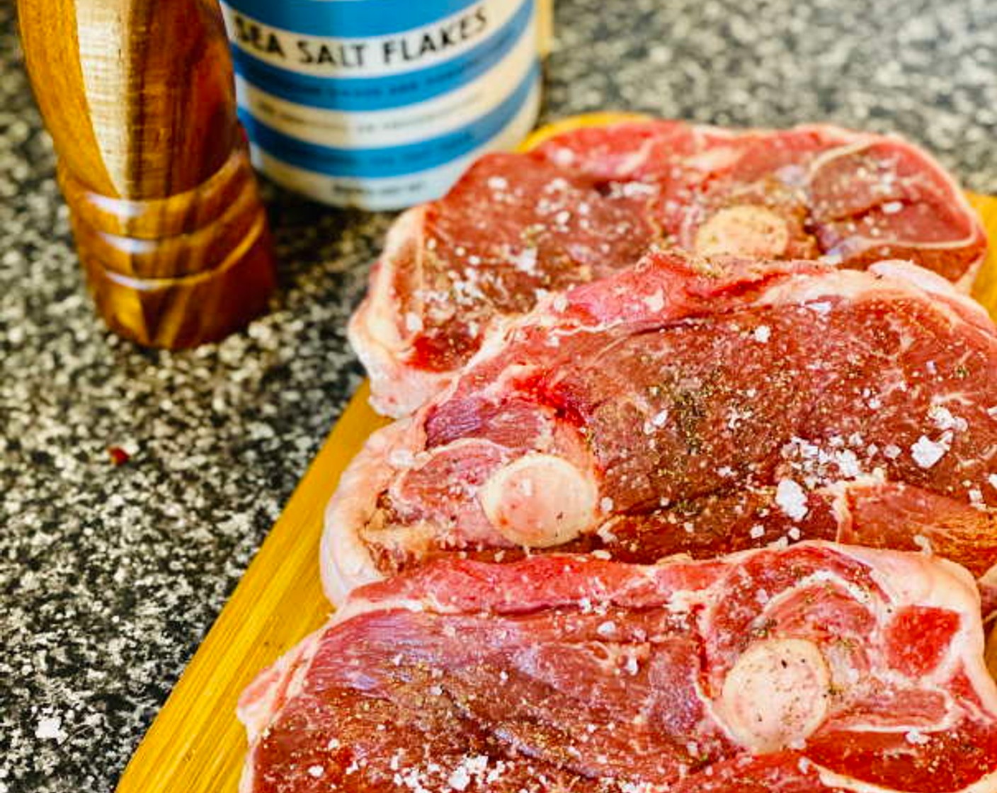 step 2 Season the Lamb Chops (2.2 lb) well with Salt (1 tsp) and Ground Black Pepper (1/2 tsp) on both sides and then dust in the All-Purpose Flour (1 Tbsp), patting into the meat to coat evenly.