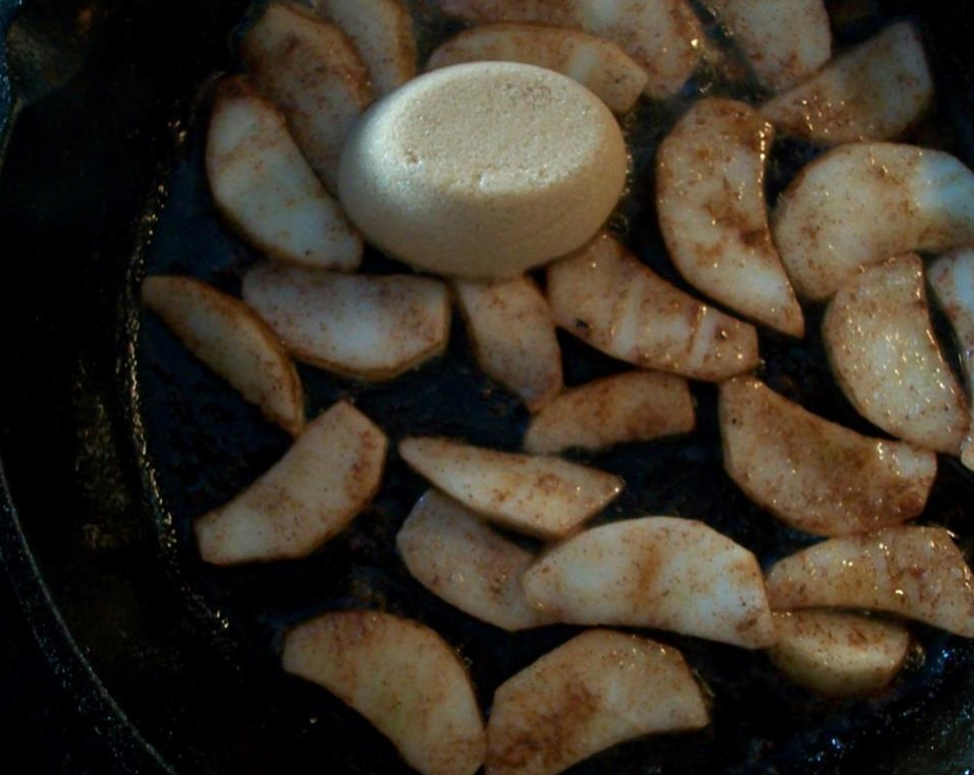 step 2 Peel, core and thinly slice the Apple (1). Add Butter (2 Tbsp) into a medium to high heat cast iron skillet. When melted, add apples, Ground Cinnamon (1/2 tsp) and Ground Nutmeg (1 pinch) Cook 2 minutes until softened.