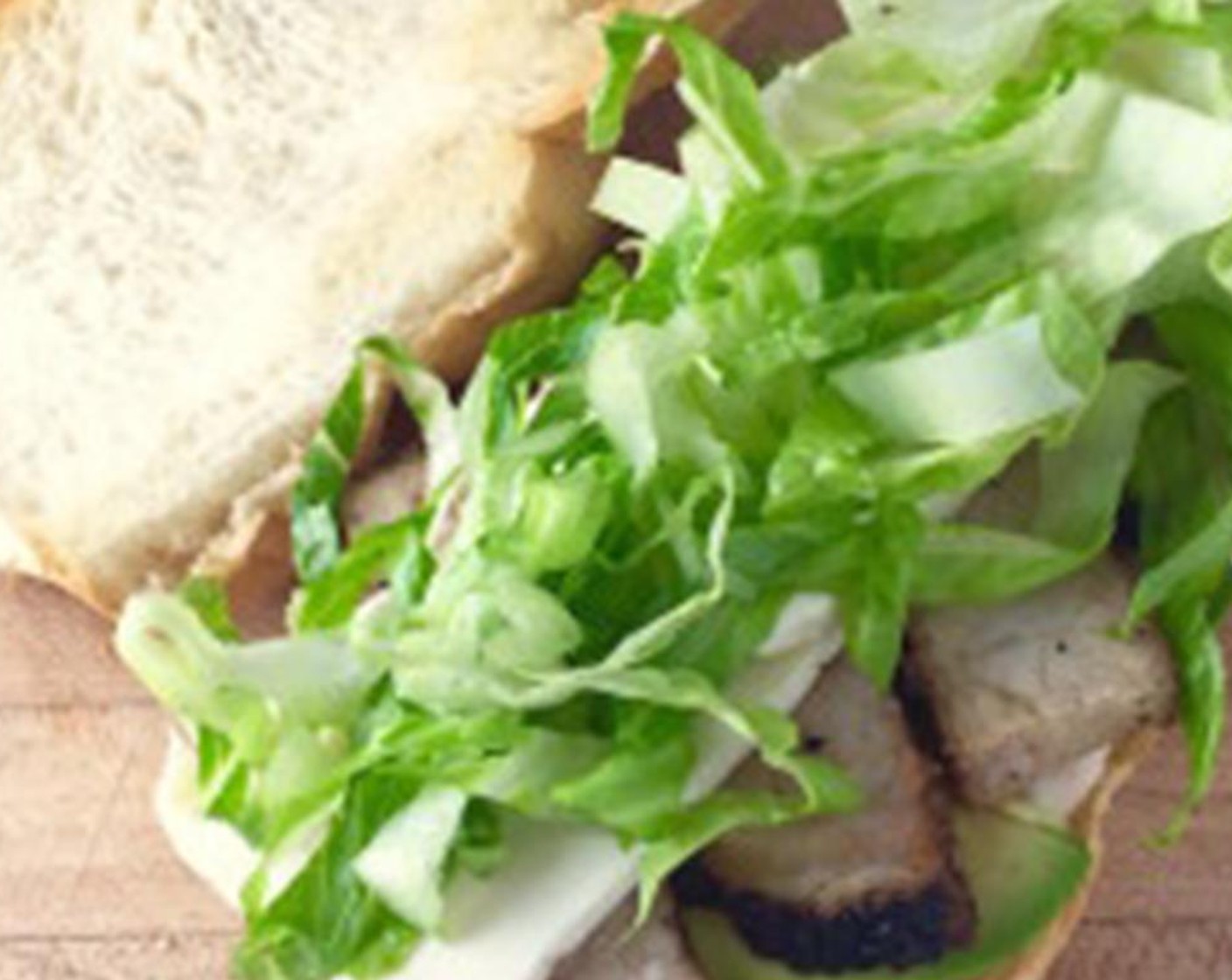step 3 Top Queso Fresco (3 2/3 Tbsp) and sliced pork and ribbons of Romaine Lettuce (1/2 cup). Enjoy!
