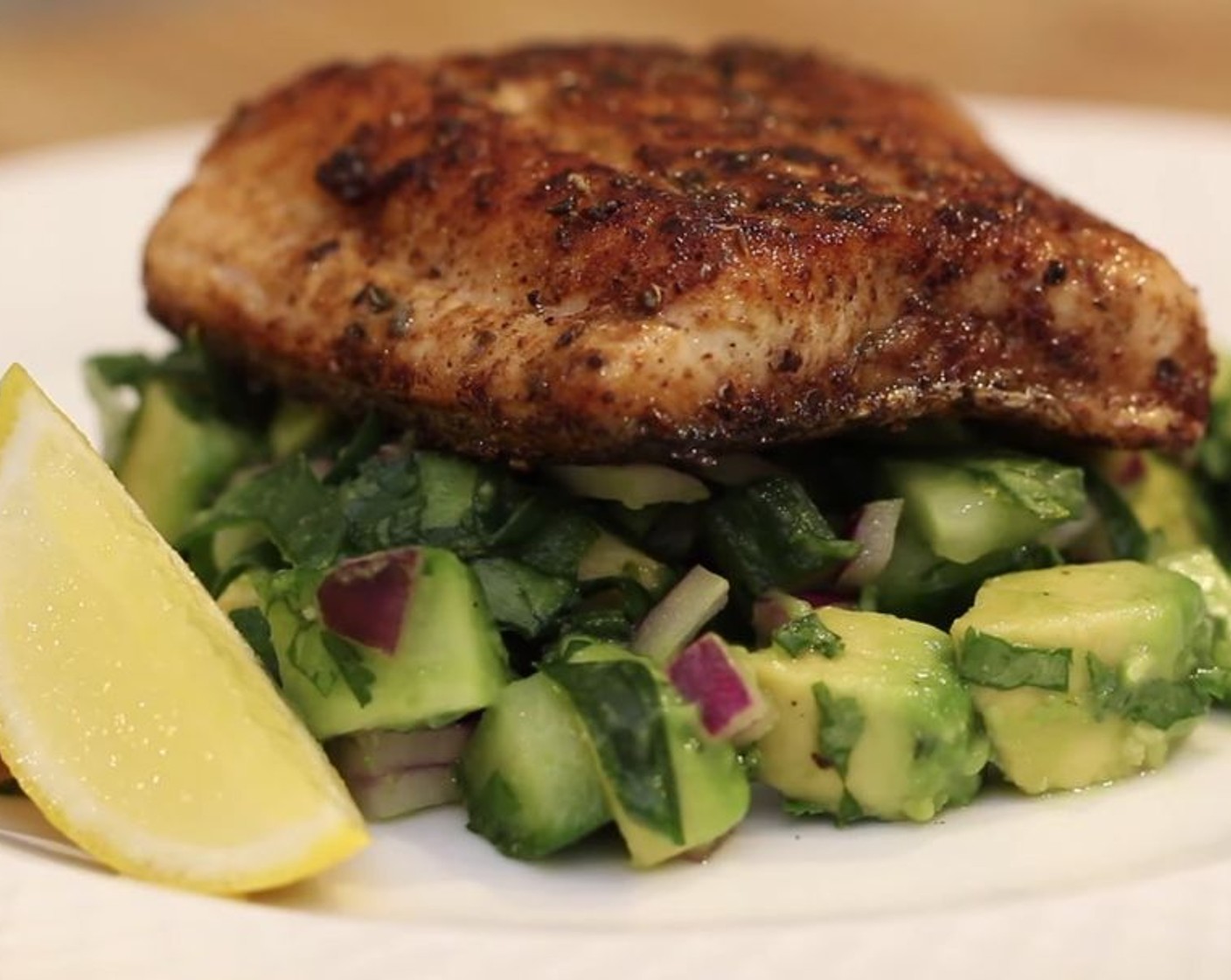 step 7 Heap the salsa into the center of each plate and then place the salmon on top. Garnish with Limes (to taste).