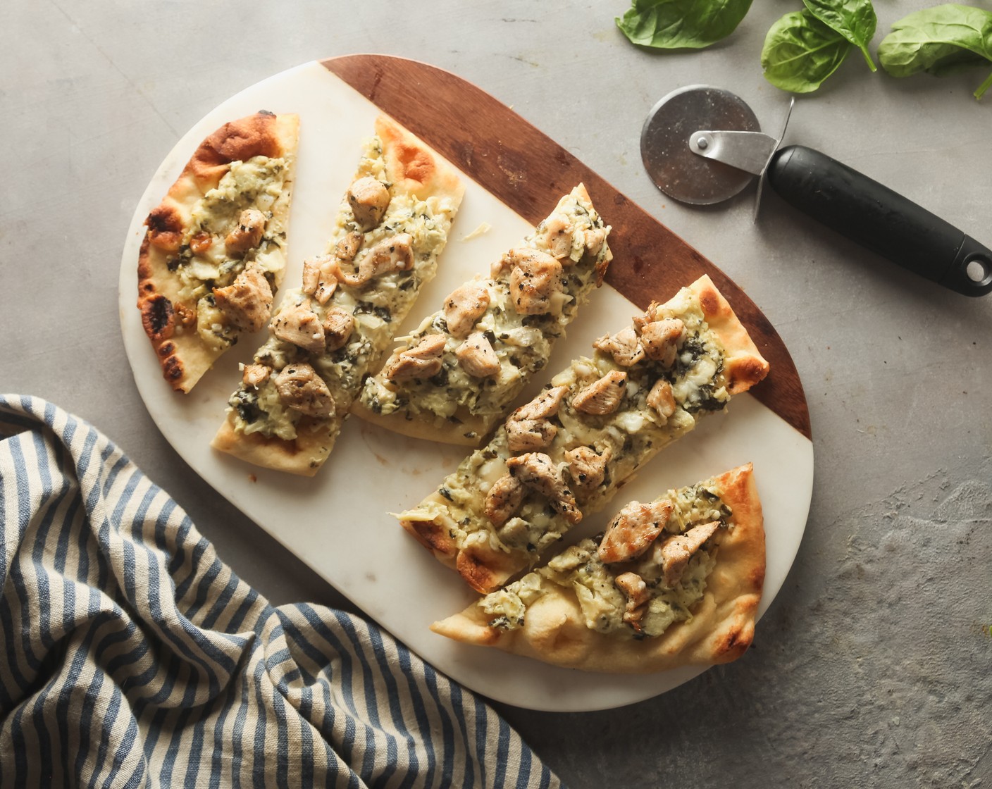 step 6 Slice each flatbread into 4 pieces and serve warm.