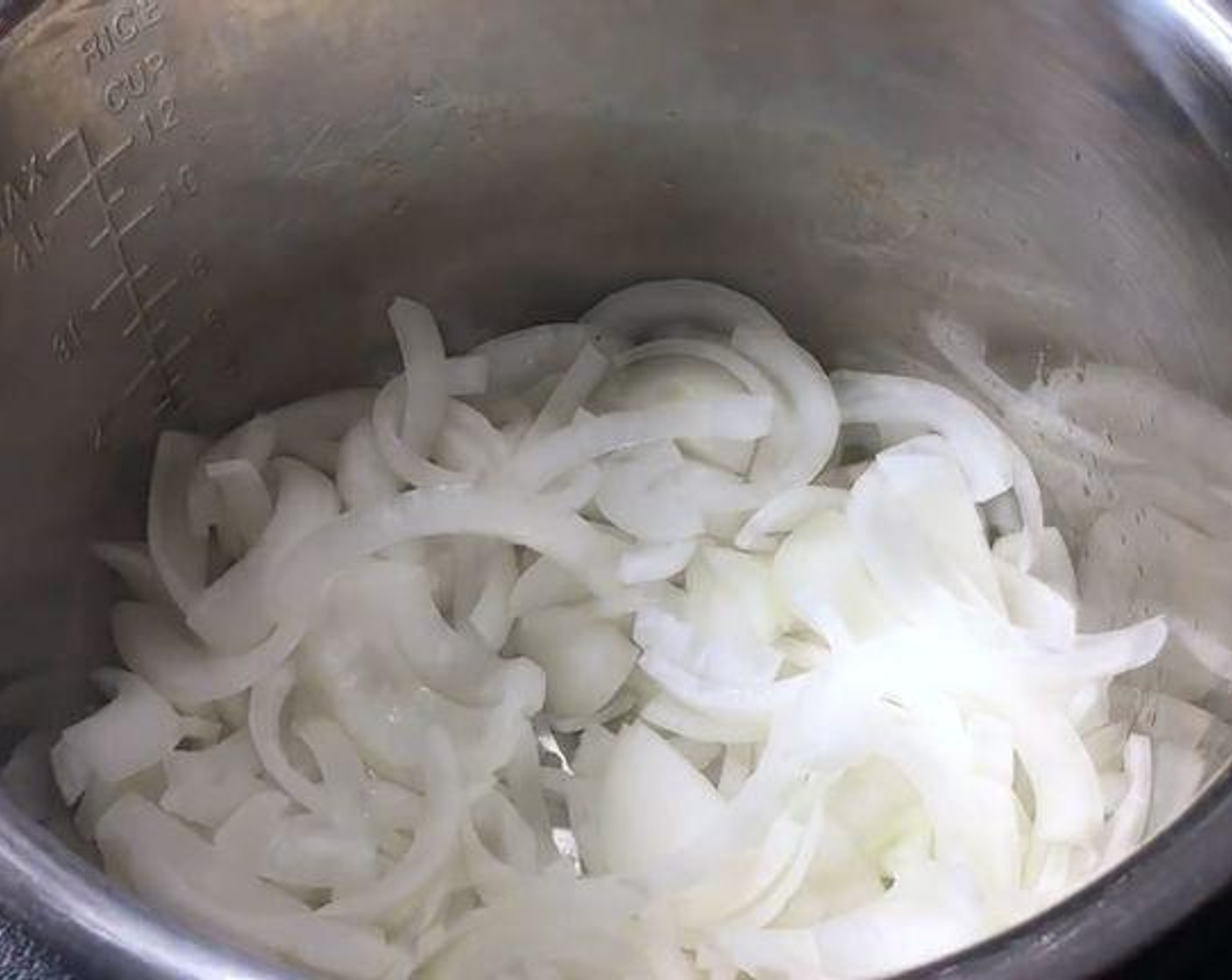 step 3 In another pot sauté Olive Oil (1 Tbsp) and Butter (3 Tbsp). Add the Yellow Onions (4 1/4 cups) and let it sit for 6 minutes.