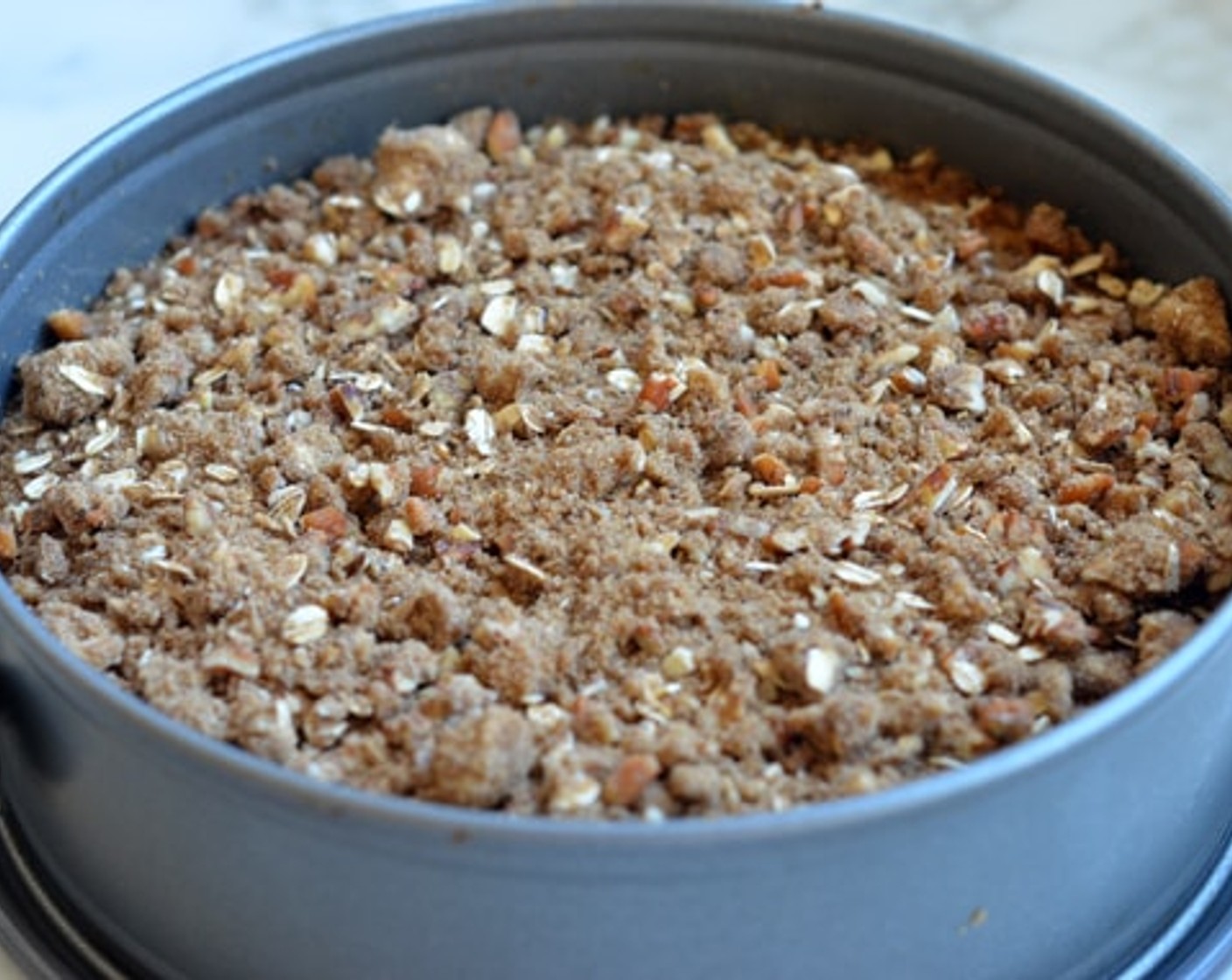 step 11 Once the torte has baked for 30 minutes, remove it from the oven and sprinkle the streusel topping evenly over top. Bake for 20-25 minutes more, or until the filling is set.