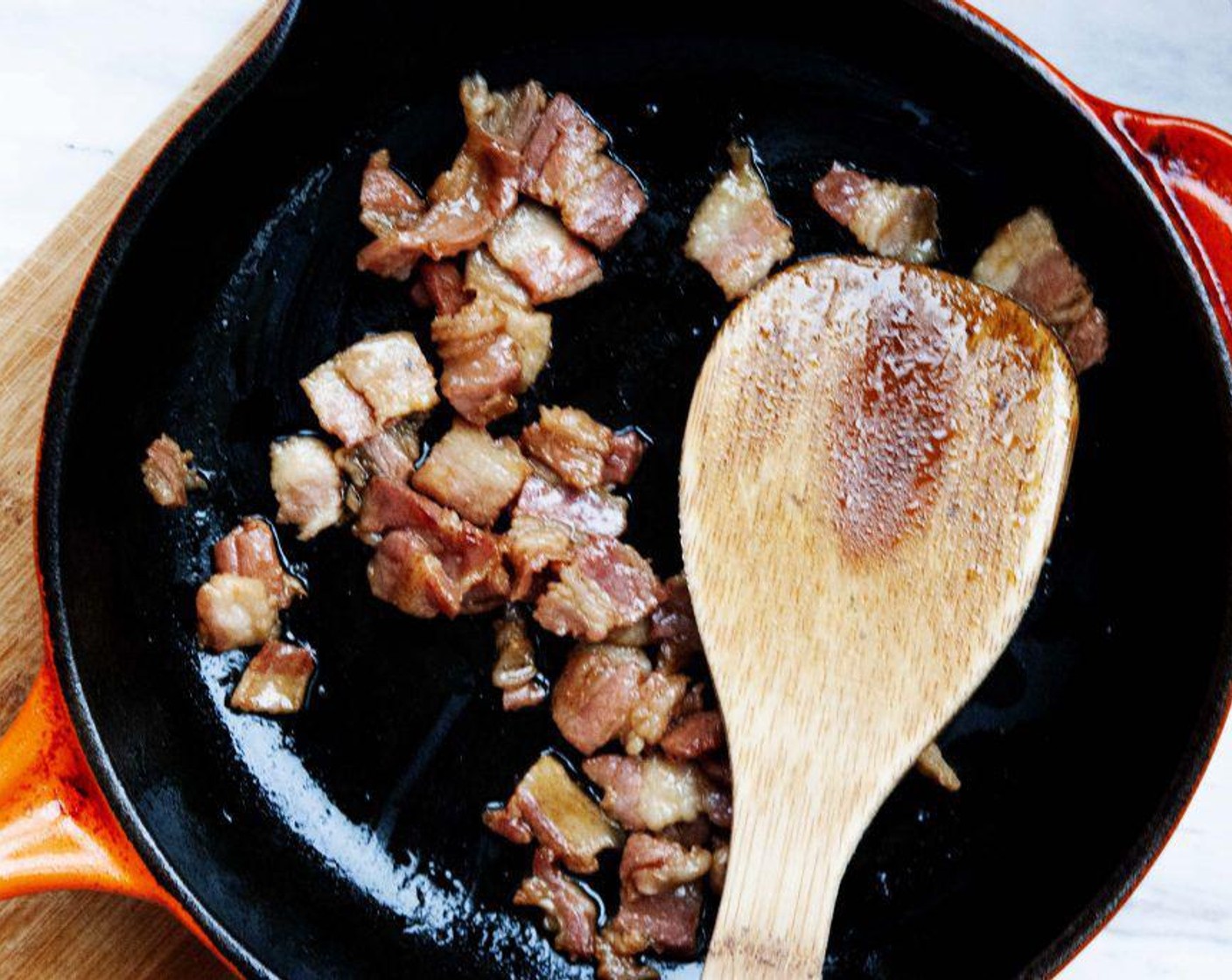 step 2 Fry the bacon in a hot skillet. No need to add any oil, the fat from the meat will be enough. Set aside.