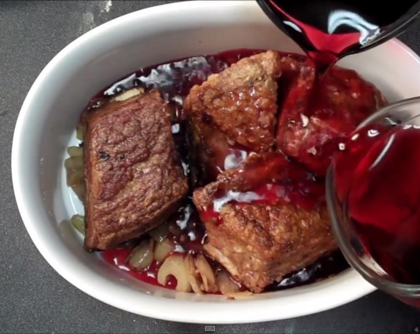 step 7 In a baking dish, combine softened vegetables, short ribs, the rest of the Pomegranate Juice (2 cups), Bay Leaves (2), and Fresh Thyme (1 sprig).