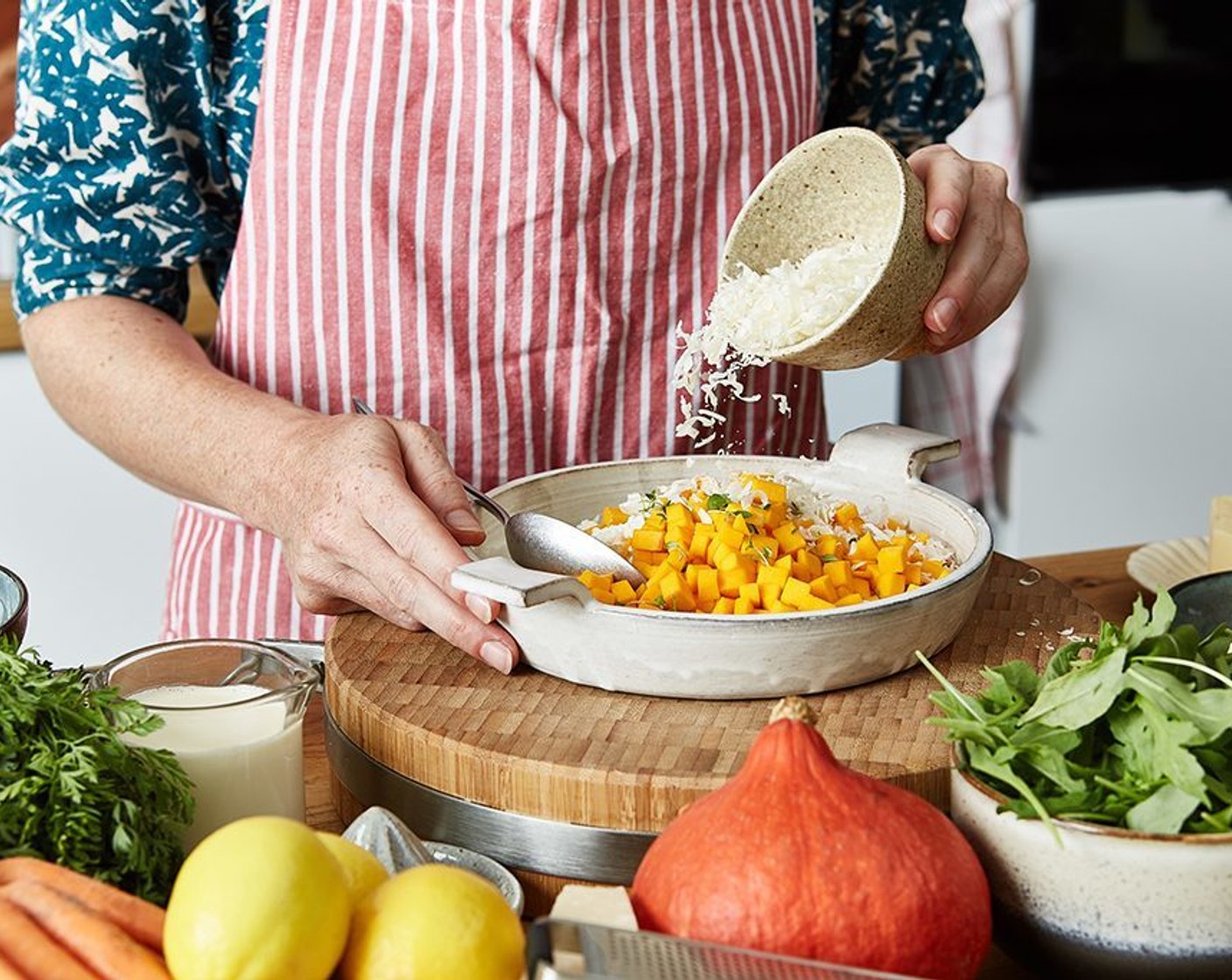 step 2 Thoroughly mix the pumpkin meat, saffron stock, Arborio Rice (3/4 cup), Grated Parmesan Cheese (1/3 cup), Feta Cheese (1/3 cup), leaves plucked from the Fresh Thyme (3 sprigs) sprigs, Cream (3 Tbsp) and Salt (1/2 tsp) in a microwave-safe flat mold (for example, ceramic casserole dish).