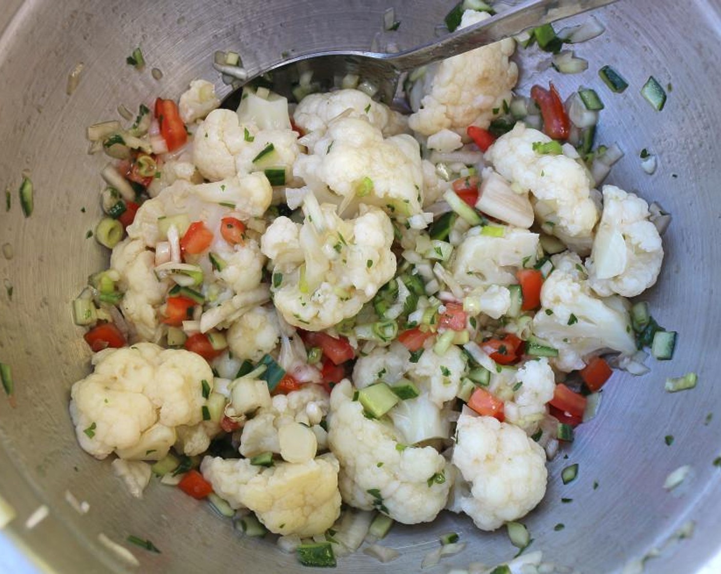 step 4 Divide the cauliflower into rosettes and add to the vinaigrette. Marinade overnight.