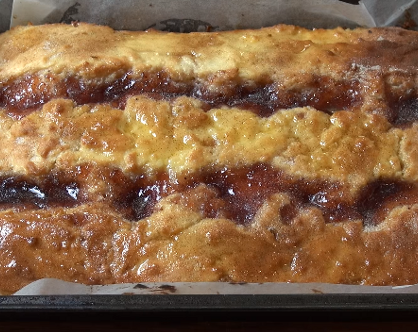 step 7 Brush the non-jammed surface of the pudding with melted butter and sprinkle the entirety with Cinnamon Sugar (1 Tbsp). Let cool at least 10 minutes before serving.