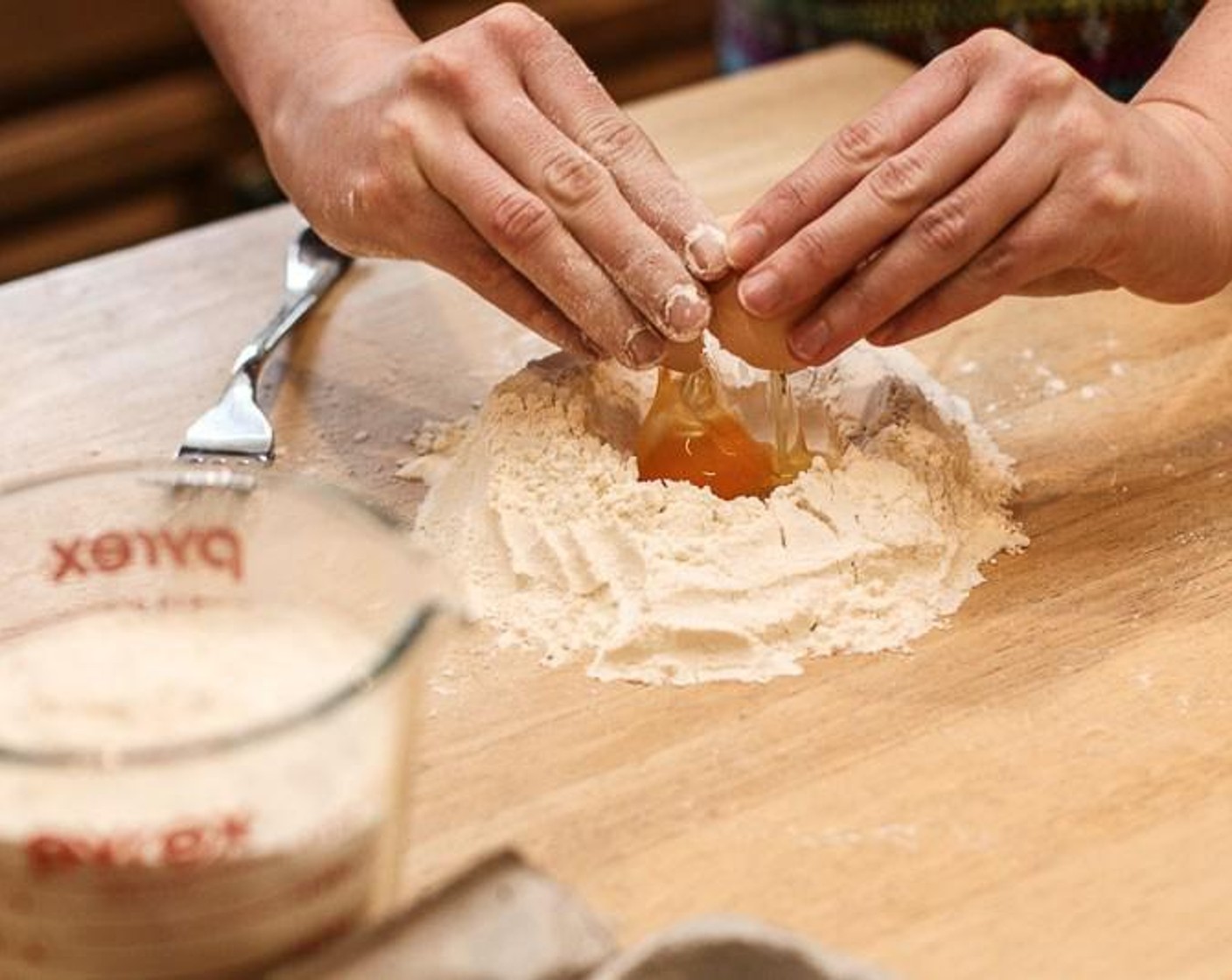 step 2 Add an Egg (1) to center of flour mound. Beat egg until thickened. Slowly incorporate surrounding flour by adding a little at a time, mixing it in with each addition.