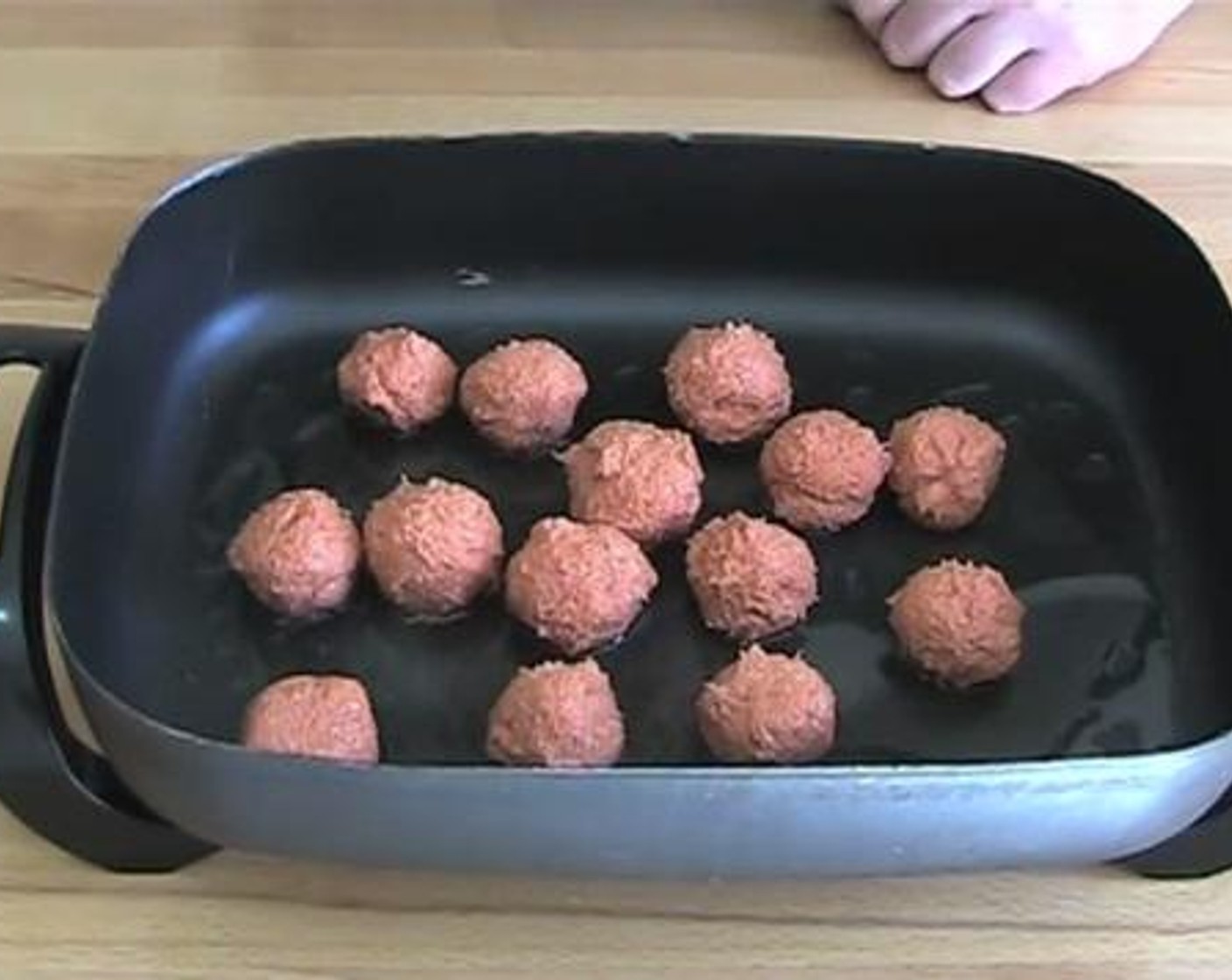 step 2 Put some Olive Oil (as needed) on a frying pan, and cook the meatballs for about five minutes until they are brown and nice.