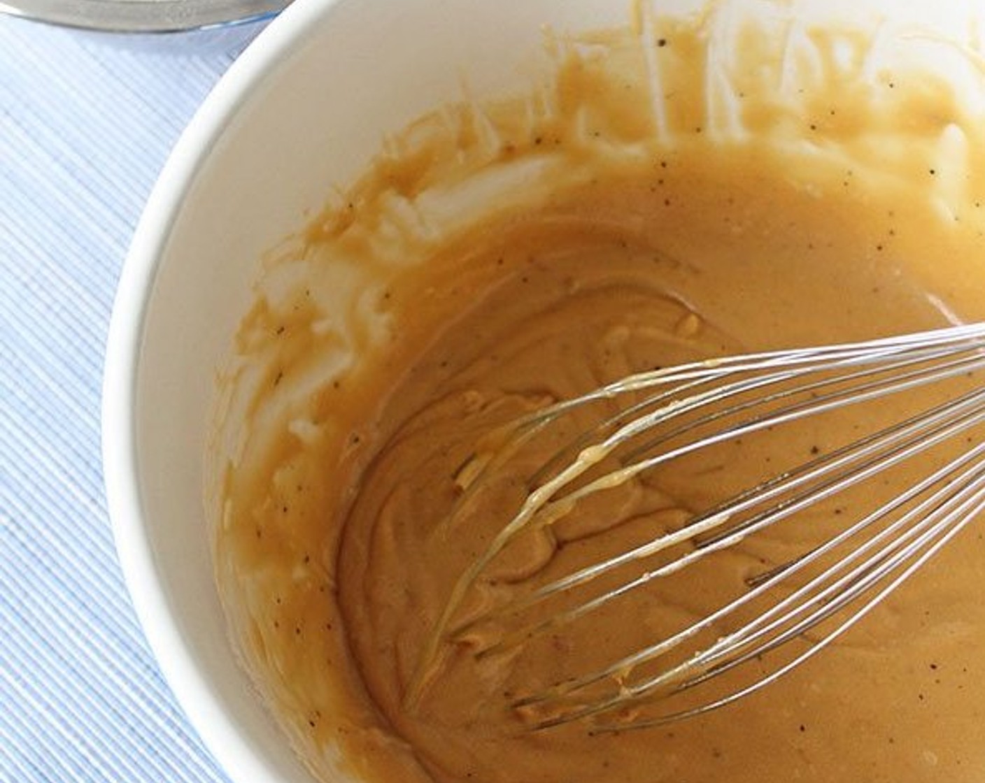 step 5 In a small bowl, combine the All-Purpose Flour (2 cups), Baking Powder (1 tsp), and Kosher Salt (1 tsp). Gradually mix the dry ingredients into the wet ingredients and stir until just combined, making sure to scrape the bottom and sides of the bowl.