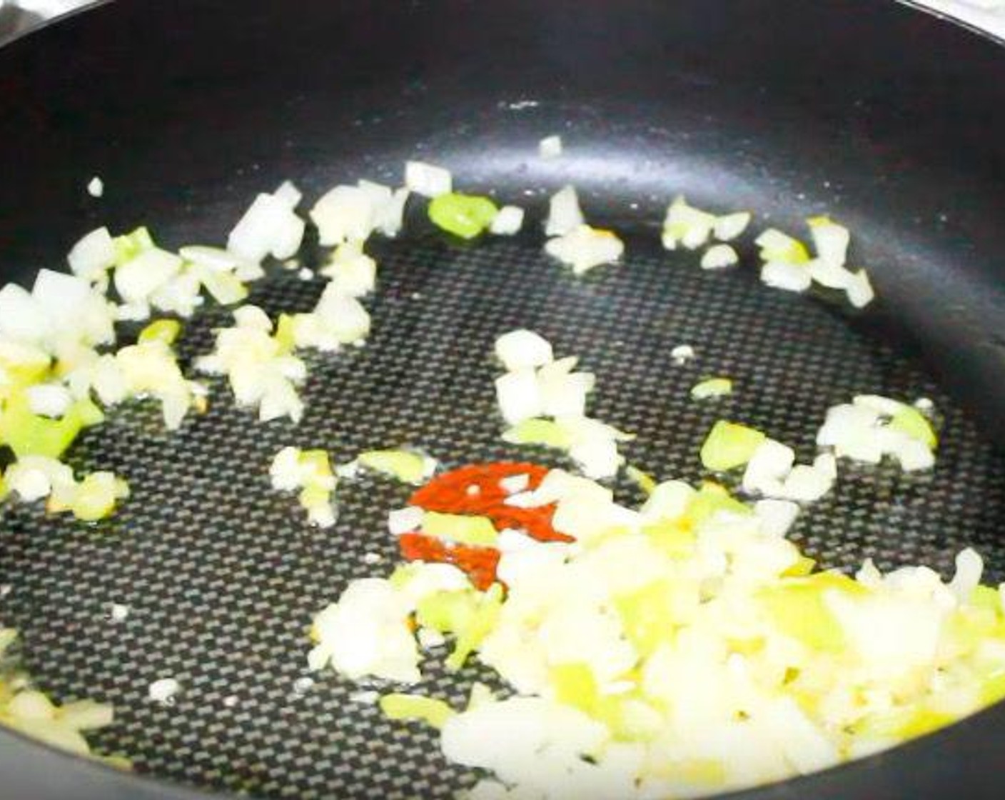 step 1 In a skillet over medium heat, add Olive Oil (2 Tbsp). Cook Onion (1) and Cubanelle Pepper (1/2) until translucent, about 2 minutes.