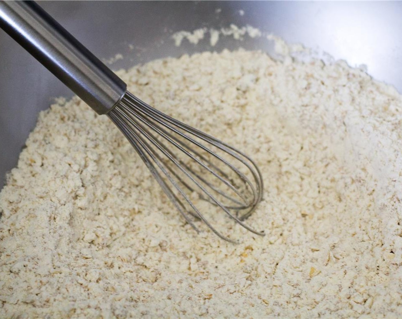 step 3 In a large bowl, add the All-Purpose Flour (2 cups), Quick Cooking Oats (1 cup), Brown Sugar (1/3 cup), Baking Powder (1 tsp), Baking Soda (1 tsp) and Salt (1/4 tsp), and whisk together.